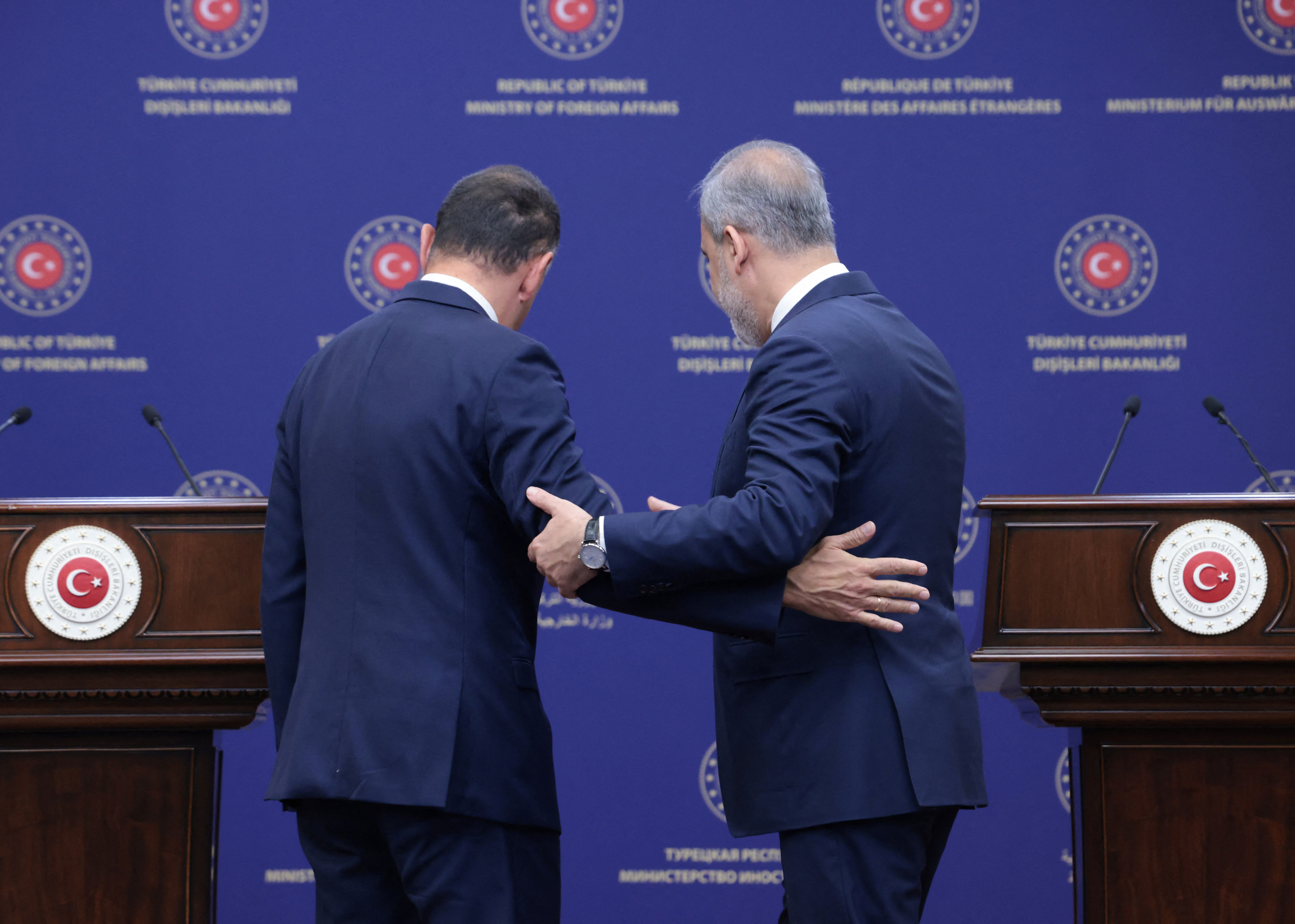 Turkish Foreign Minister Hakan Fidan and his Greek counterpart George Gerapetritis leave following a press conference in Ankara, Turkey September 5, 2023. REUTERS