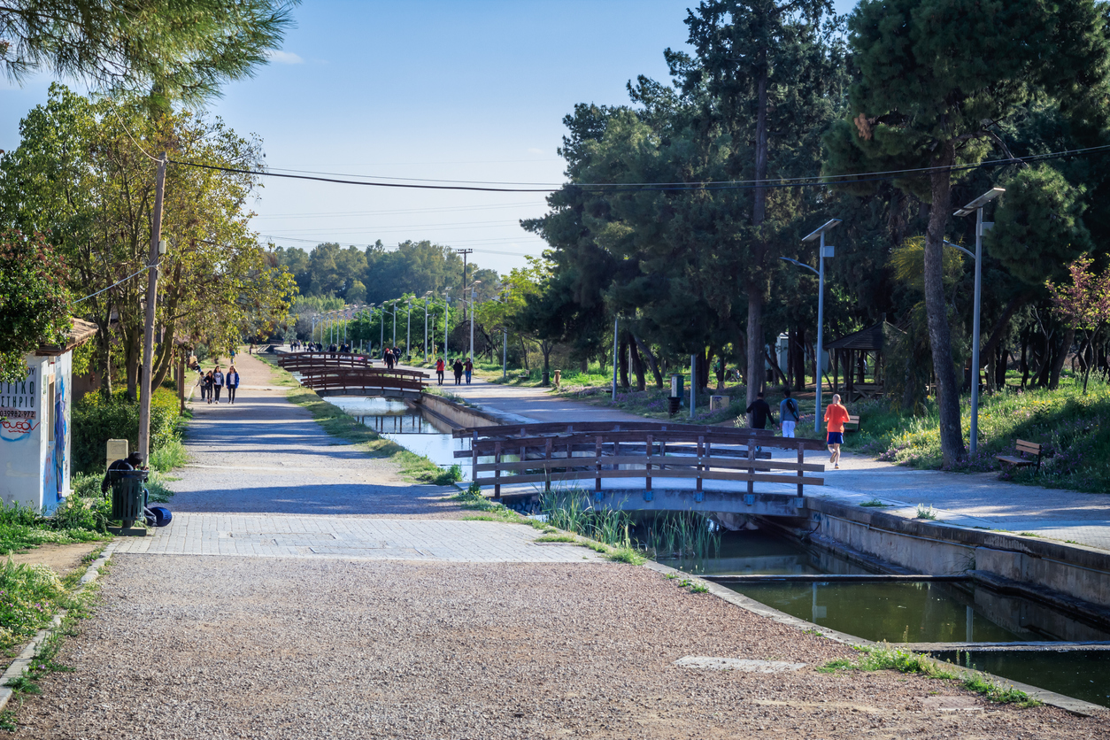Athens, Greece - June, 2019. The wonderful lake in Tritsis Park of Ilion city.