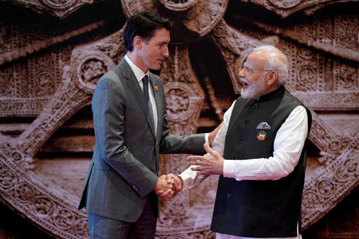 FILE PHOTO: Indian Prime Minister Narendra Modi welcomes Canada Prime Minister Justin Trudeau upon his arrival at Bharat Mandapam convention center for the G20 Summit, in New Delhi, India, Saturday, Sept. 9, 2023. Evan Vucci