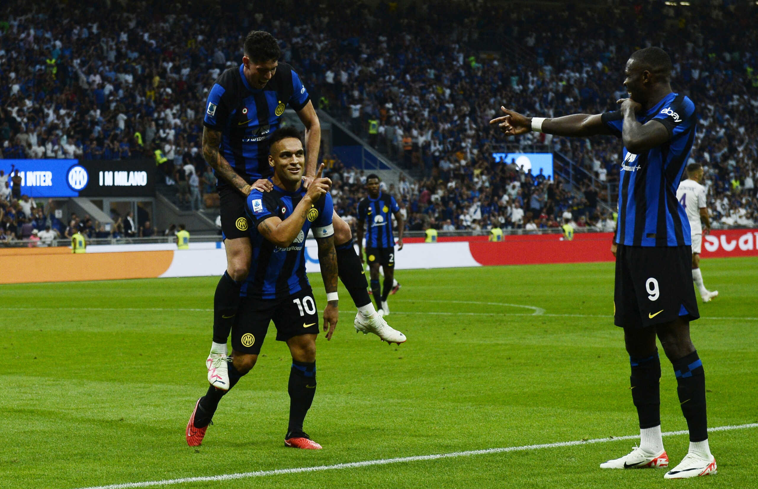 Soccer Football - Serie A - Inter Milan v Fiorentina - San Siro, Milan, Italy - September 3, 2023 Inter Milan's Lautaro Martinez celebrates scoring their second goal with Alessandro Bastoni and Marcus Thuram REUTERS