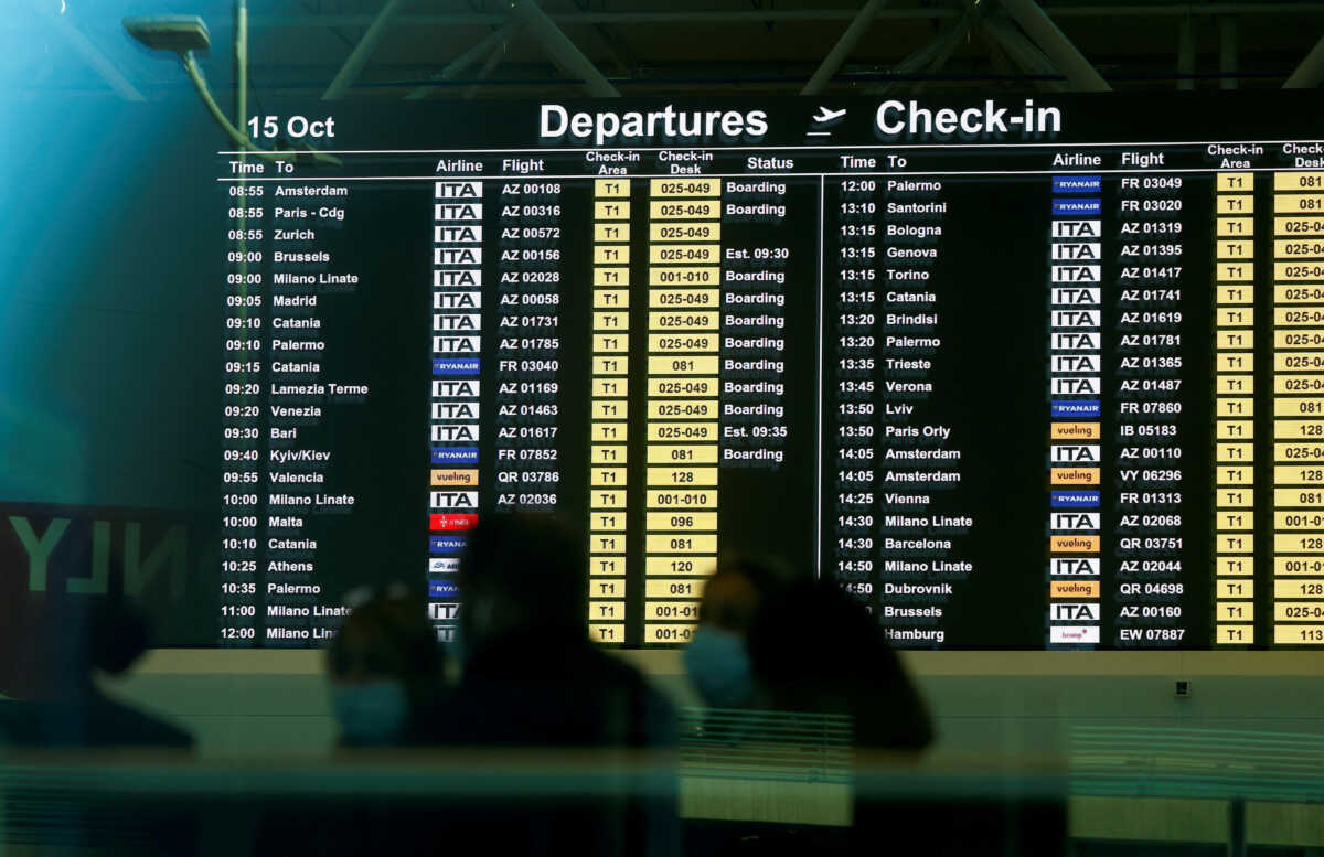 The information screen at Fiumicino airport displays ITA flights as the new airline carrier starts flying in place of bankrupt Alitalia, in Rome, Italy, October 15, 2021. REUTERS