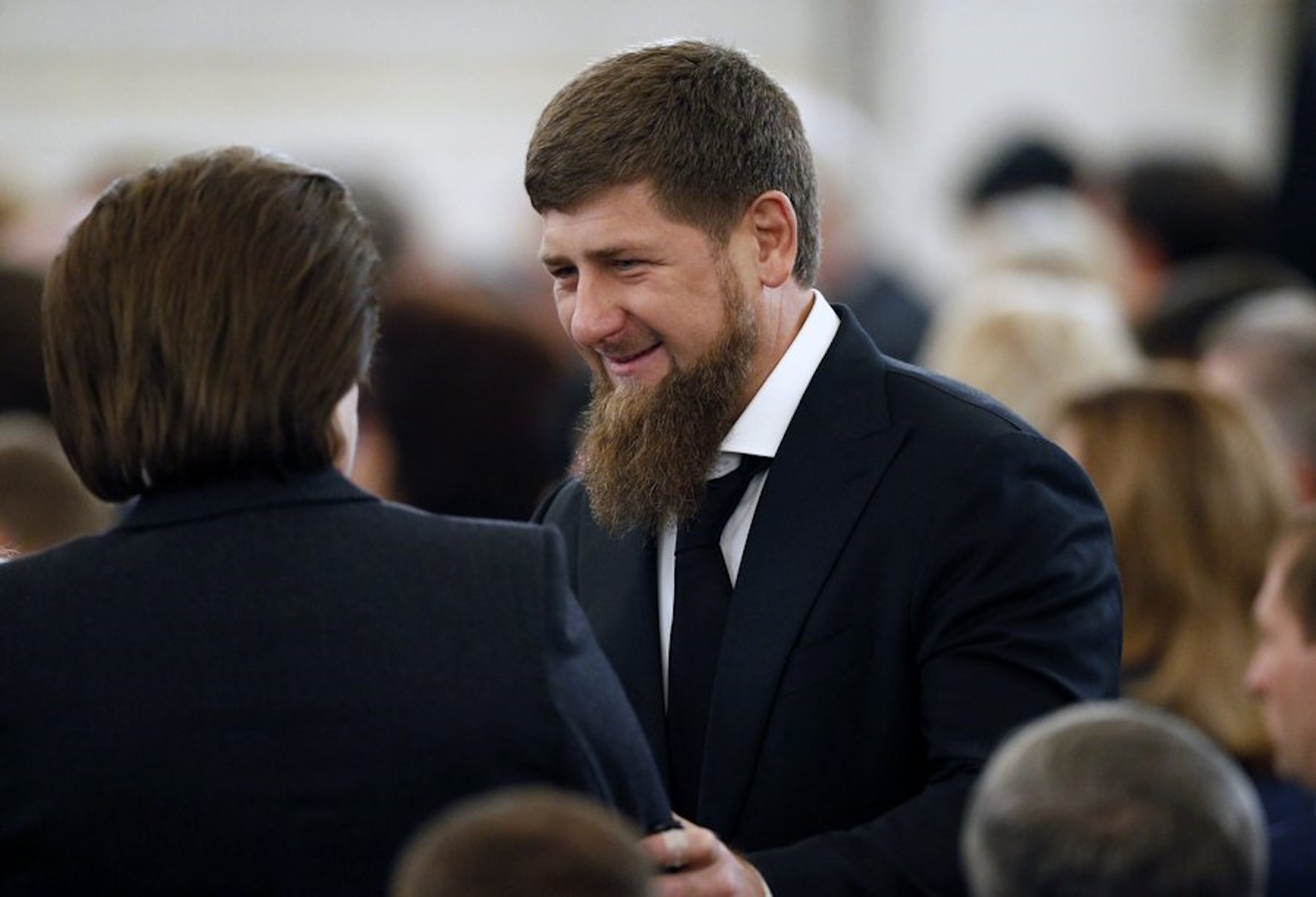 epa05654778 Ramzan Kadyrov, Head of the Chechen Republic, chats with an unidentified participants as they wait for Russian President Vladimir Putin to deliver an address to the Federal Assembly in the Grand Kremlin Palace in Moscow, Russia, 01 December 2016. Putin on 01 December is to give his annual state of the nation speech in the State Duma which is expected to touch on issues on both the national and international agendas.  EPA