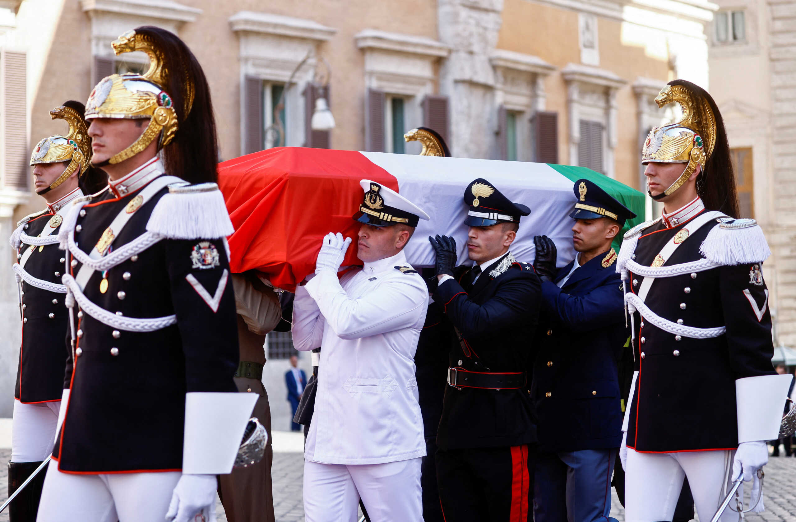 Pallbearers carry the casket of former Italian President and senator, Giorgio Napolitano, on the day of his state funeral in Rome, Italy, September 26, 2023. REUTERS
