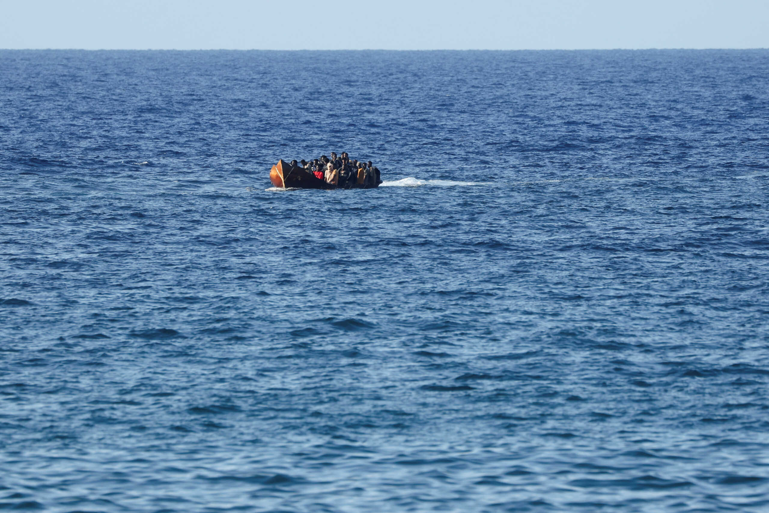 A vessel with migrants approaches the Sicilian island of Lampedusa, Italy, September 16, 2023. REUTERS