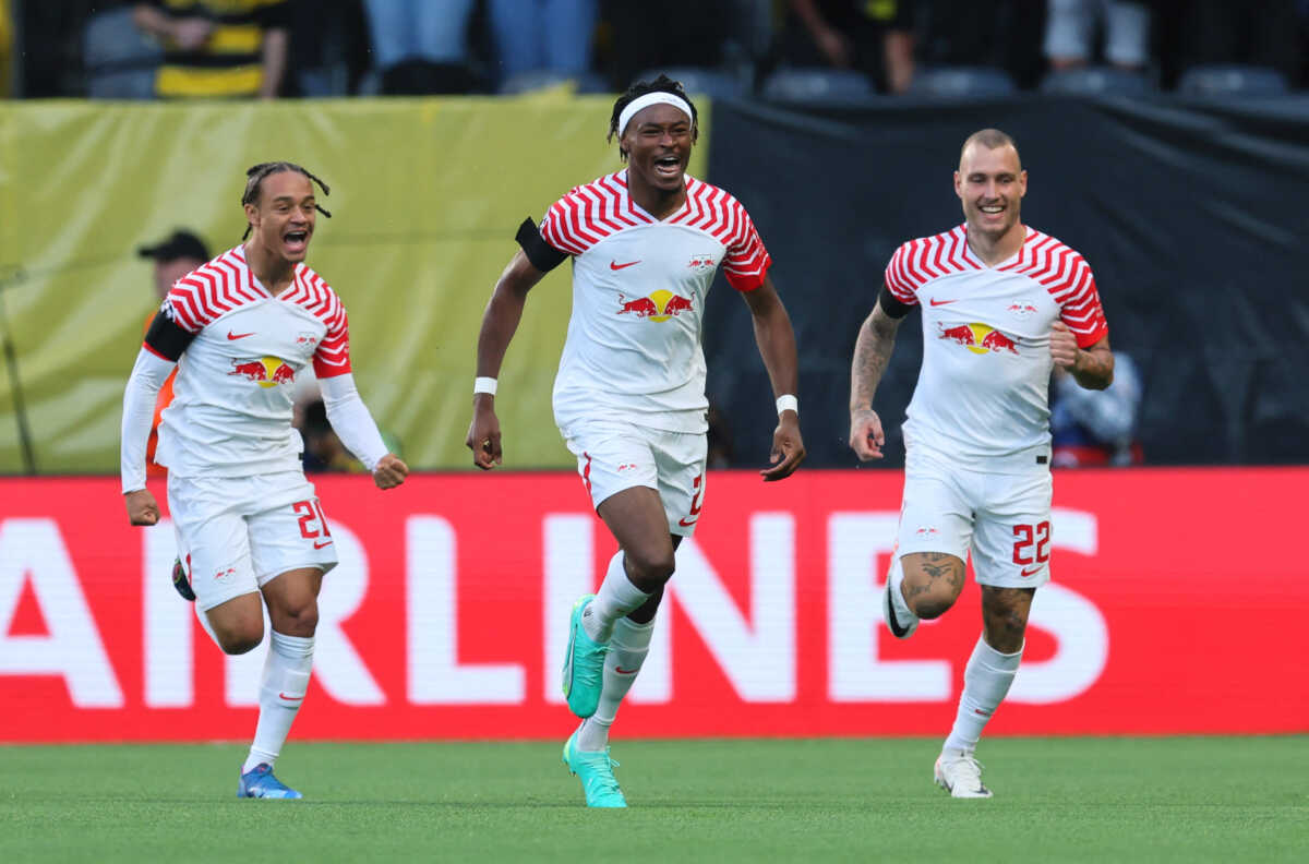 Soccer Football - Champions League - Group G - BSC Young Boys v RB Leipzig - Stadion Wankdorf, Bern, Switzerland - September 19, 2023  RB Leipzig's Mohamed Simakan celebrates scoring their first goal with teammates Xavi Simons and David Raum REUTERS