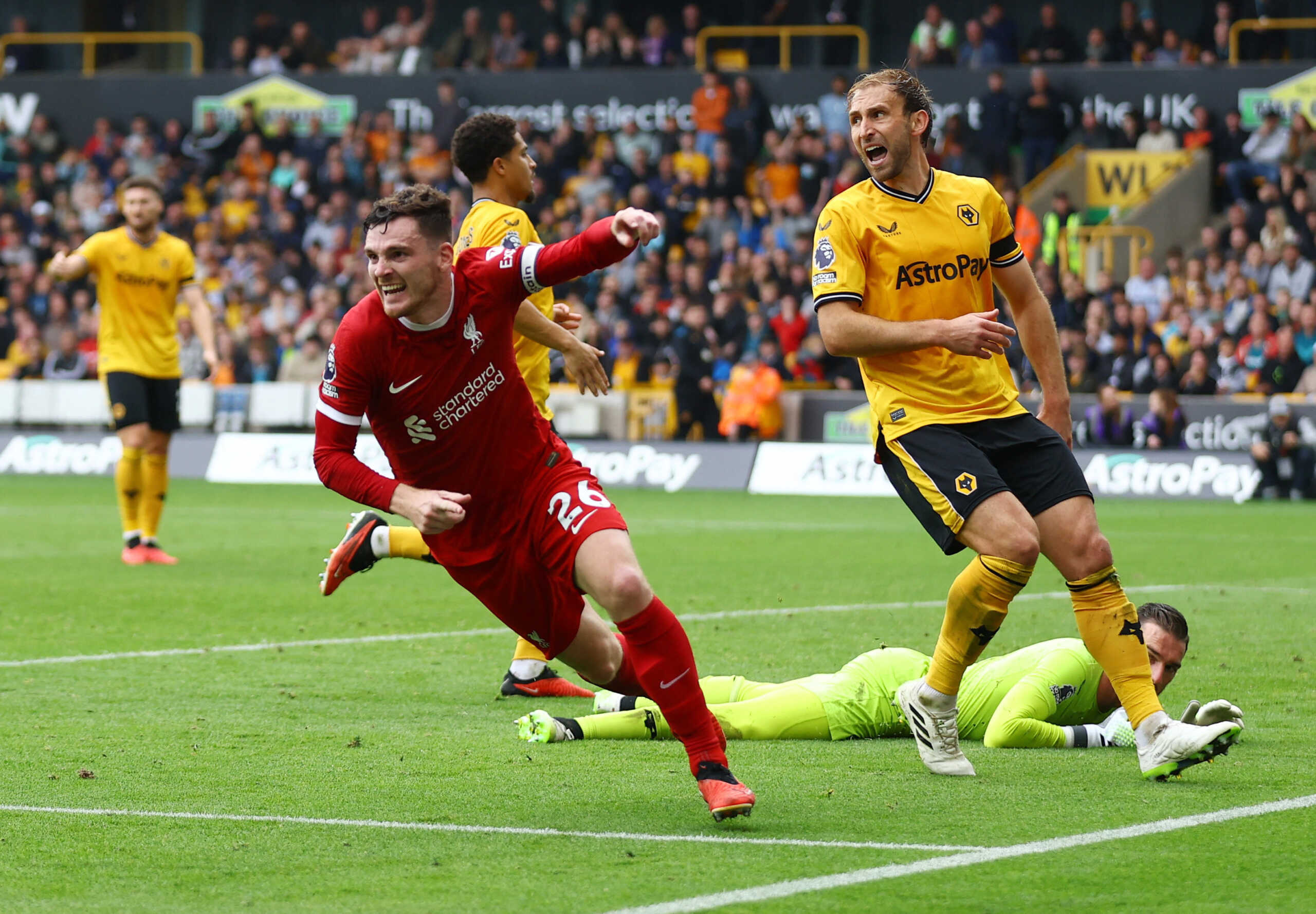 Soccer Football - Premier League - Wolverhampton Wanderers v Liverpool - Molineux Stadium, Wolverhampton, Britain - September 16, 2023 Liverpool's Andrew Robertson celebrates scoring their second goal Action Images via Reuters