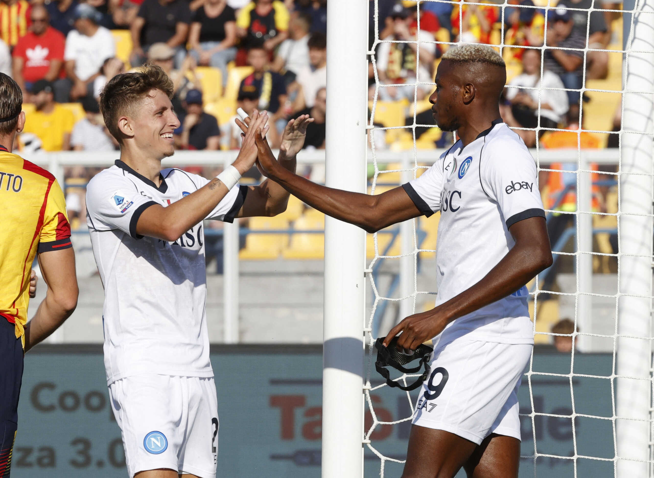 Soccer Football - Serie A - Lecce v Napoli - Stadio Via del mare, Lecce, Italy - September 30, 2023 Napoli's Victor Osimhen celebrates scoring their second goal with Jesper Lindstrom REUTERS