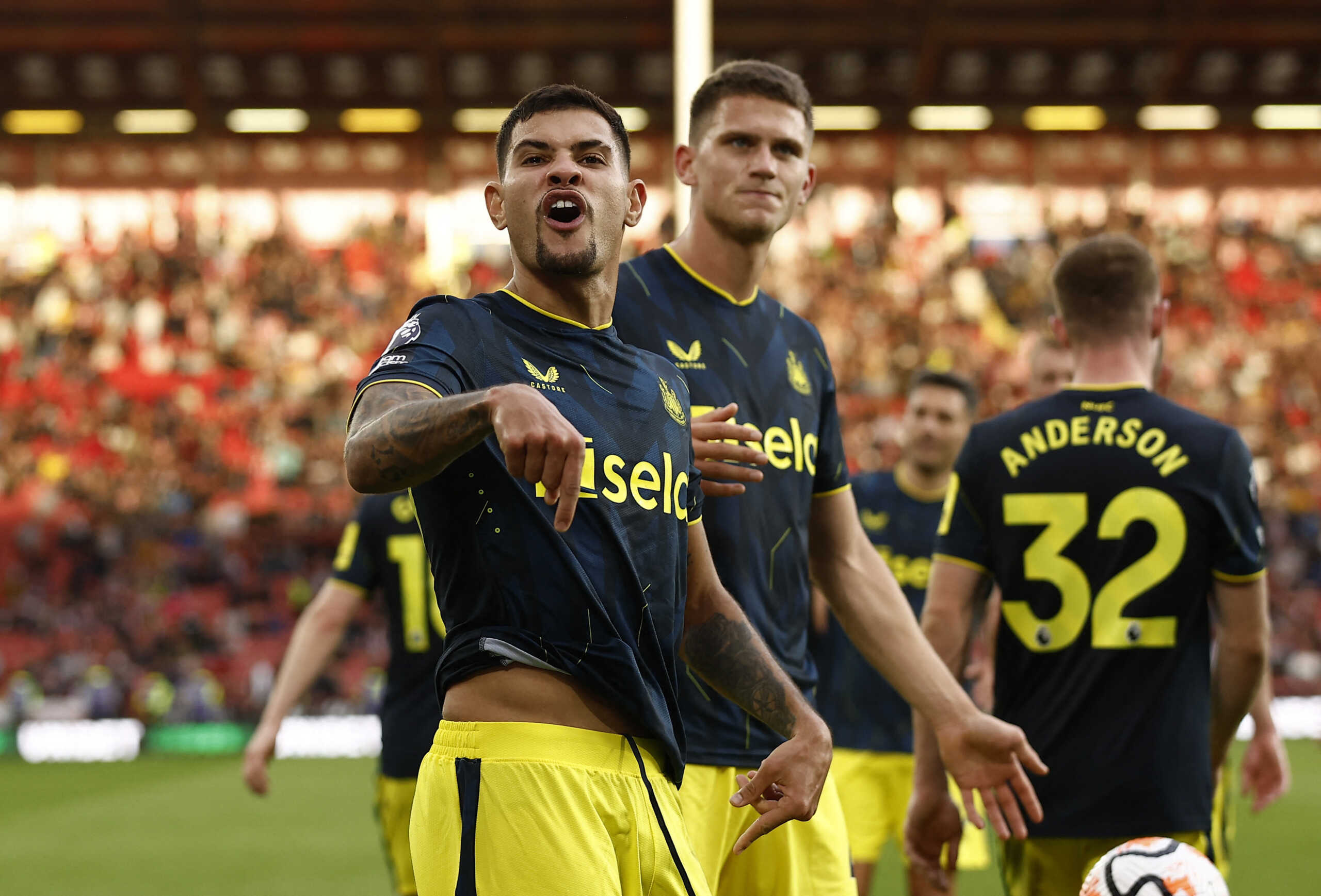 Soccer Football - Premier League - Sheffield United v Newcastle United - Bramall Lane, Sheffield, Britain - September 24, 2023 Newcastle United's Bruno Guimaraes celebrates scoring their seventh goal with Sven Botman Action Images via Reuters