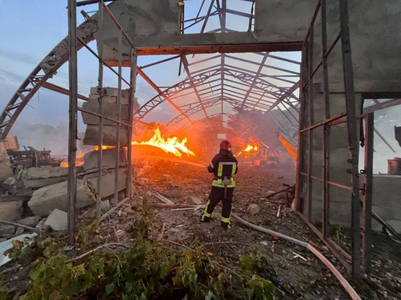 A firefighter works at a site that was hit amid Russian drone attacks, at a location given as Odesa region, Ukraine in this handout image released September 4, 2023.  Ukraine's Operational Command 'South'