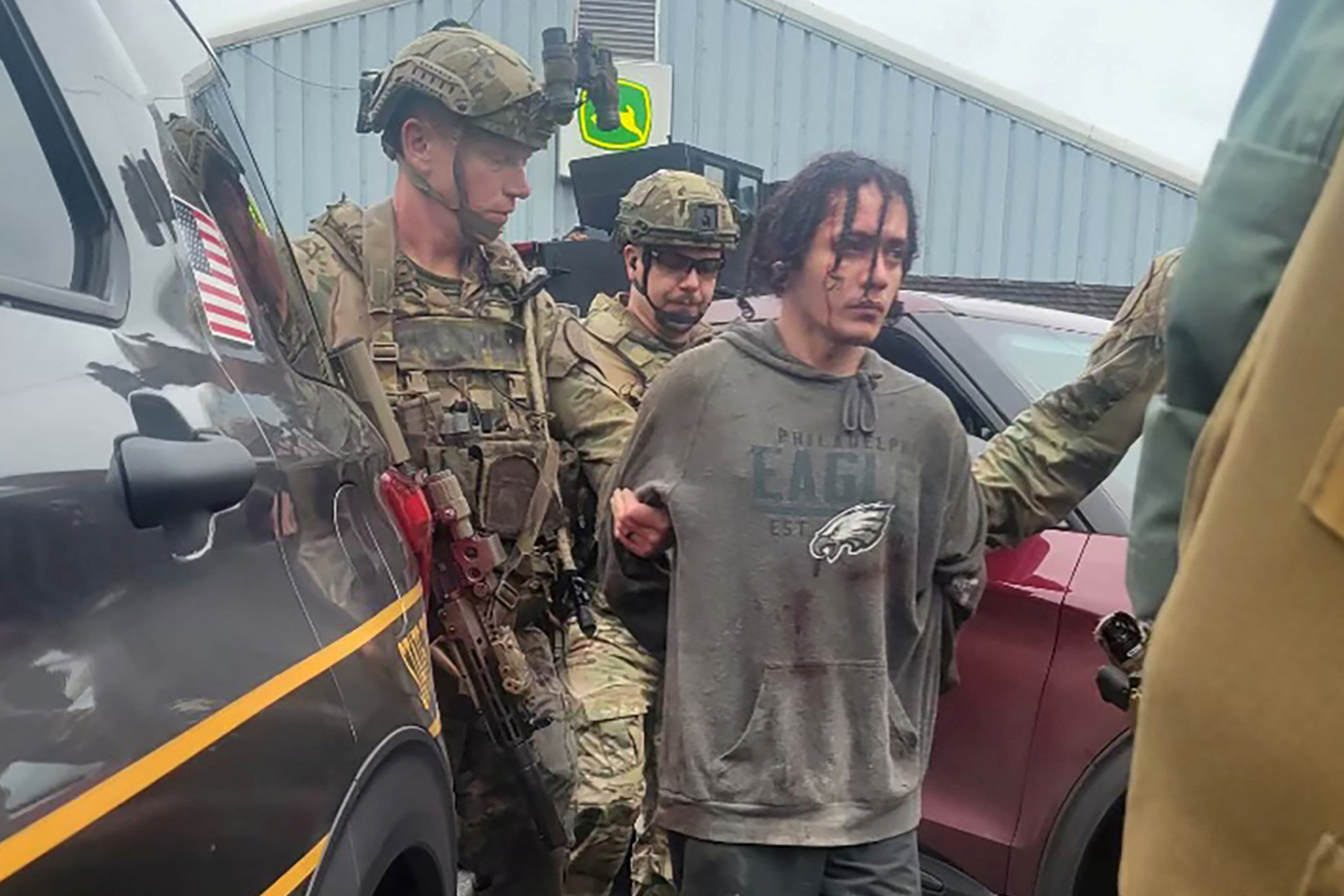 Escaped fugitive Danelo Cavalcante, 34, a Brazilian who escaped from Chester County Prison where he was awaiting transfer to a state prison to serve a life sentence for killing his ex-girlfriend, is taken into custody by law enforcement officers in Chester County, Pennsylvania, U.S. September 13, 2023. Pennsylvania State Police