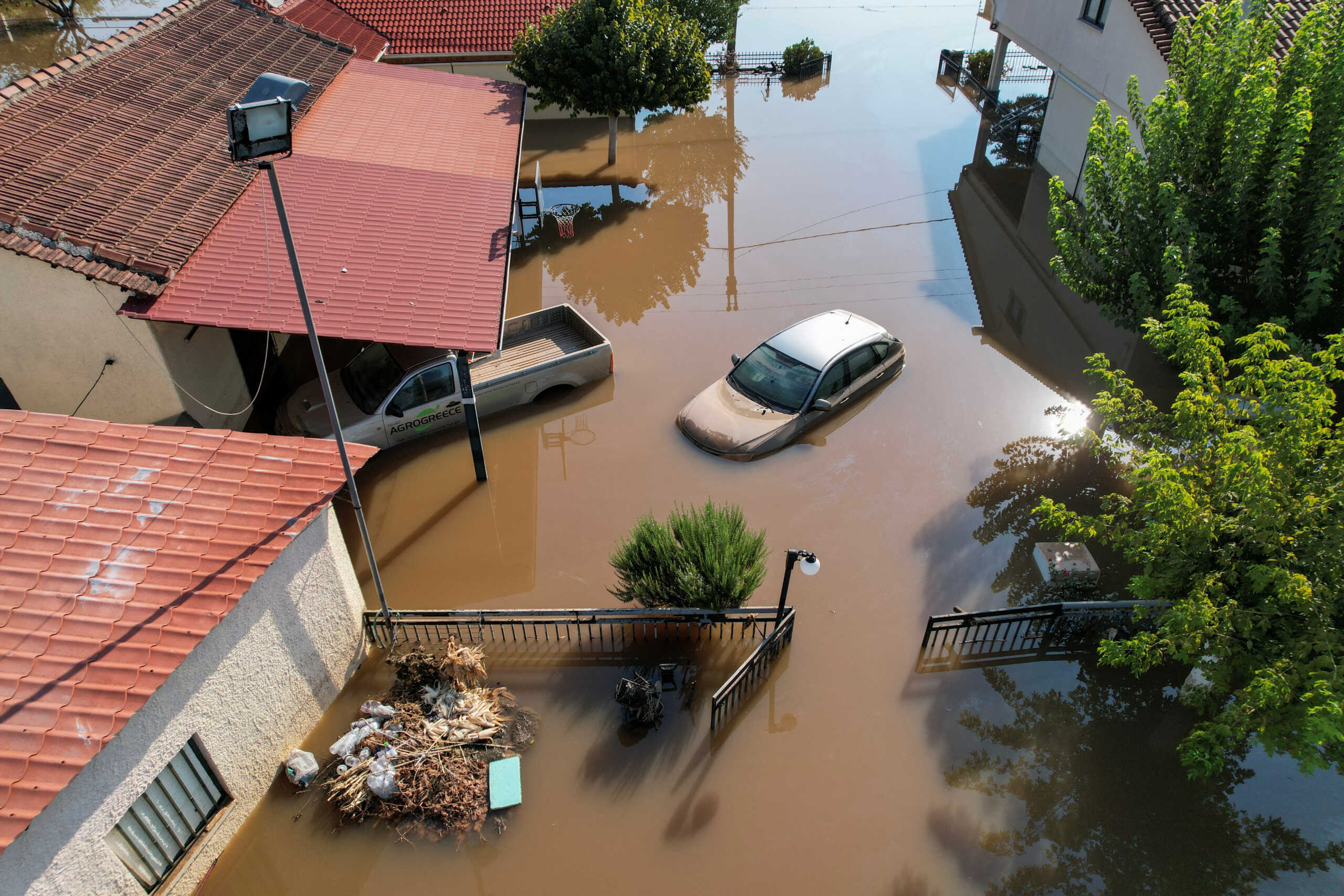 Cars are submerged in a flooded area, in the aftermath of Storm Daniel, in Megala Kalyvia, Greece, September 9, 2023. REUTERS
