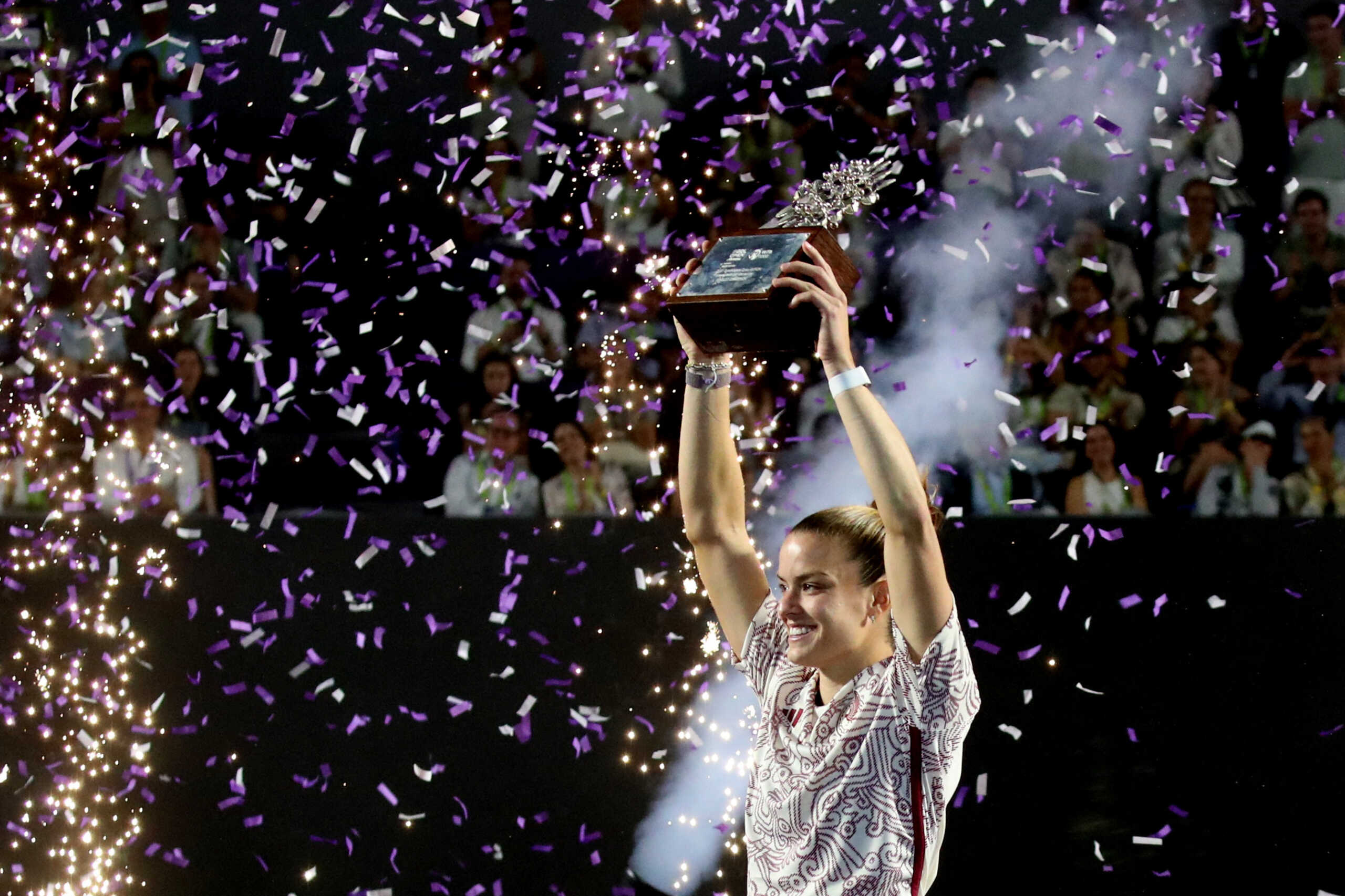 Tennis - WTA 1000 - Guadalajara Open - Panamerican Tennis Center, Guadalajara, Mexico - September 23, 2023 Greece's Maria Sakkari celebrates with the trophy after winning her final match against Caroline Dolehide of the U.S. REUTERS