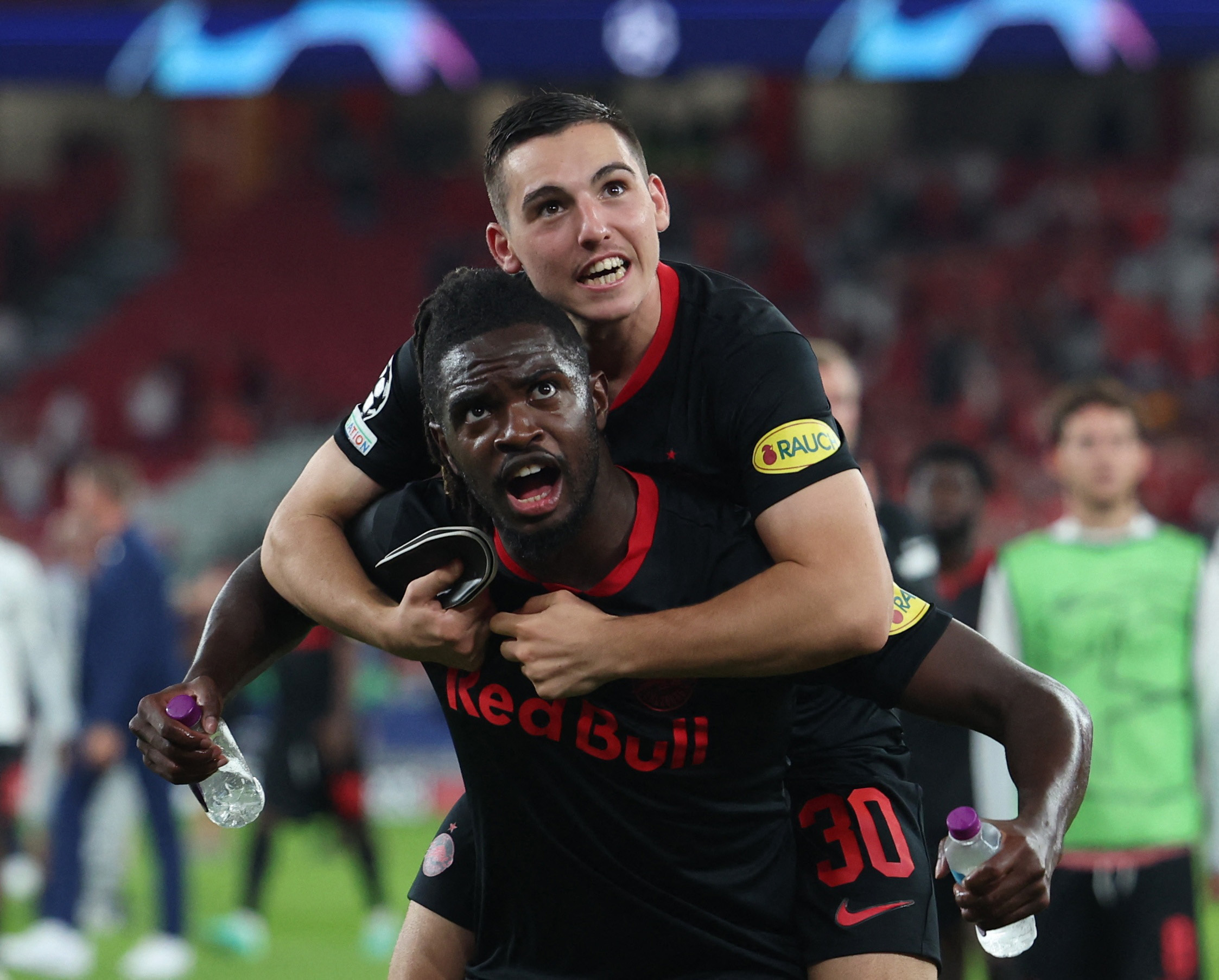 Soccer Football - Champions League - Group D - Benfica v FC Salzburg - Estadio da Luz, Lisbon, Portugal - September 20, 2023 FC Salzburg's Oscar Gloukh and Oumar Solet celebrate after the match REUTERS