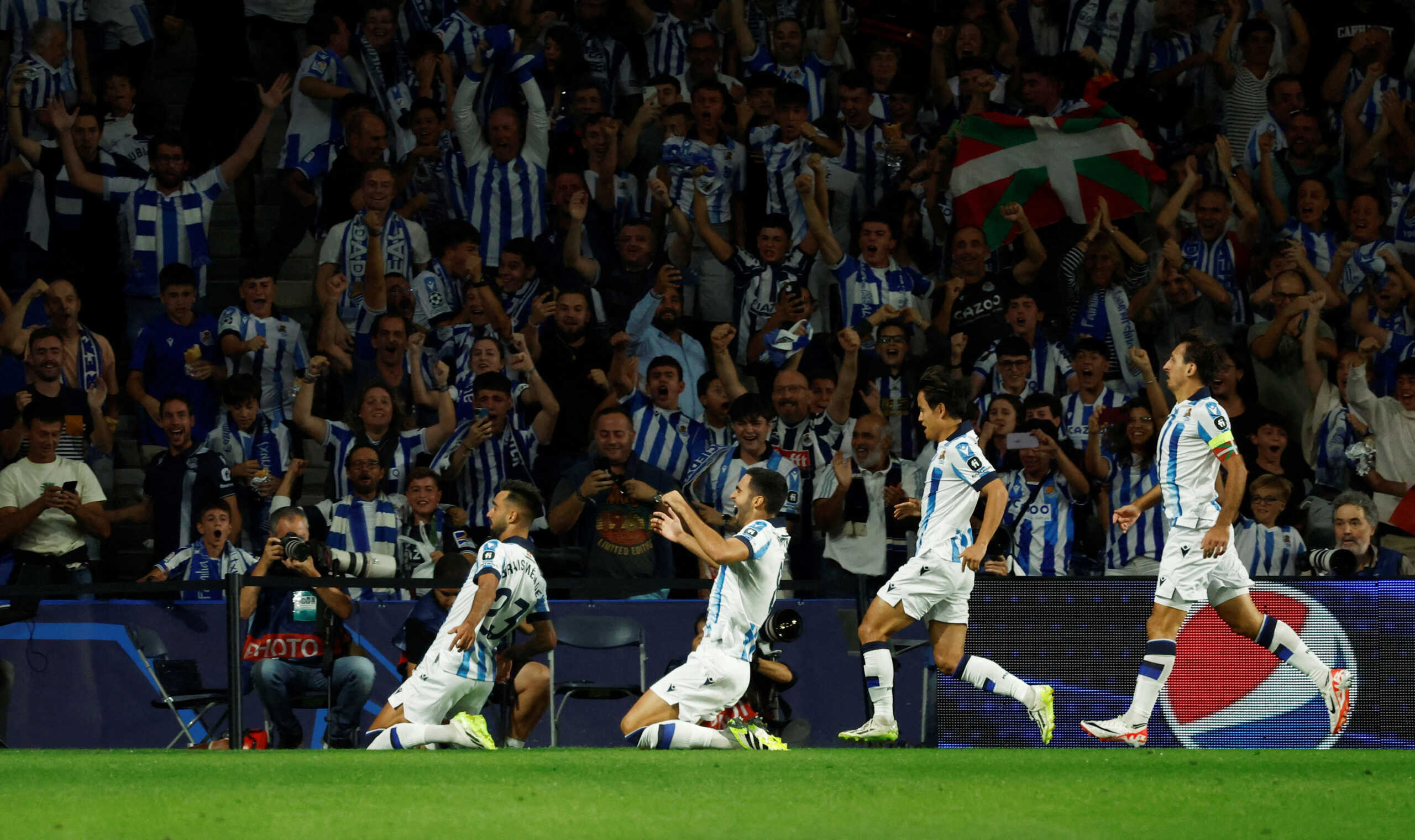 Soccer Football - Champions League - Group D - Real Sociedad v Inter Milan - Reale Arena, San Sebastian, Spain - September 20, 2023 Real Sociedad's Brais Mendez celebrates scoring their first goal with teammates REUTERS