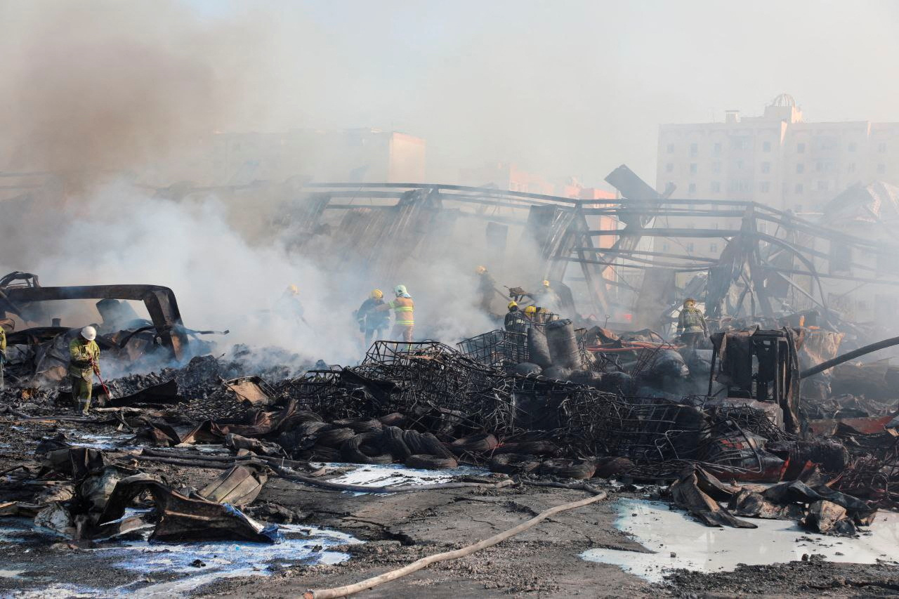 Specialists work to extinguish fire following an explosion at a warehouse near an airport in Tashkent, Uzbekistan, in this picture released September 28, 2023. Government of Uzbekistan