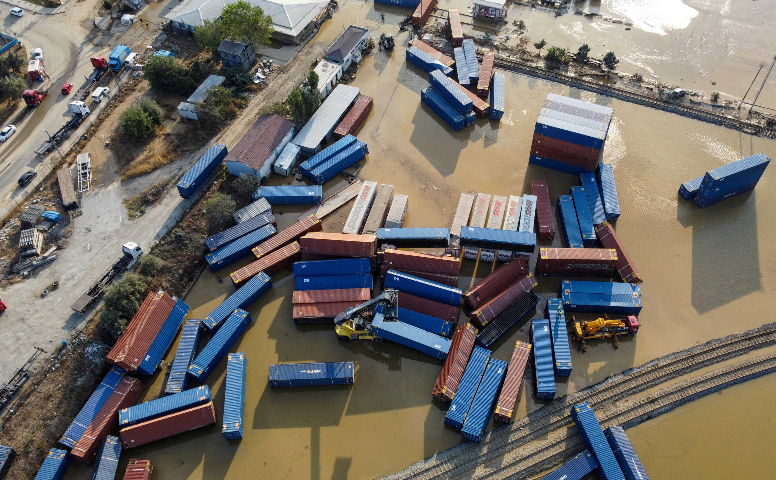 Strewn containers are seen in flooded waters after heavy downpours in Istanbul, Turkey September 6, 2023. REUTERS