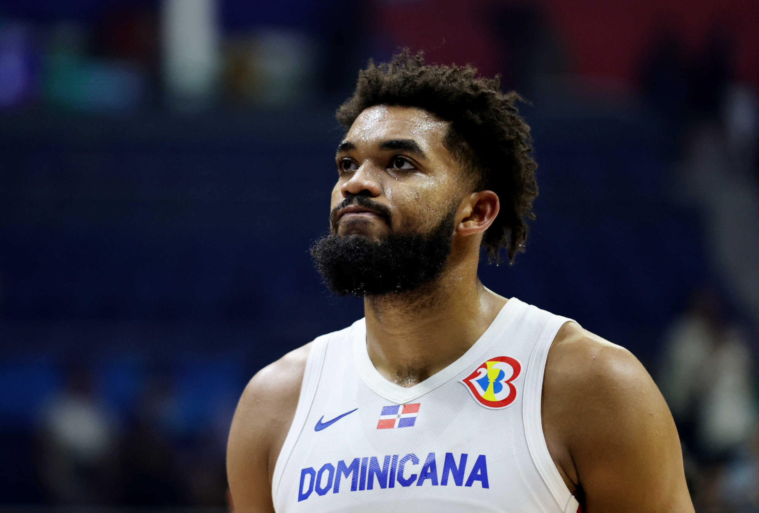 Basketball - FIBA World Cup 2023 - Second Round - Group I - Dominican Republic v Puerto Rico - Araneta Coliseum, Quezon, Philippines - September 1, 2023 Dominican Republic's Karl-Anthony Towns looks dejected after the match REUTERS