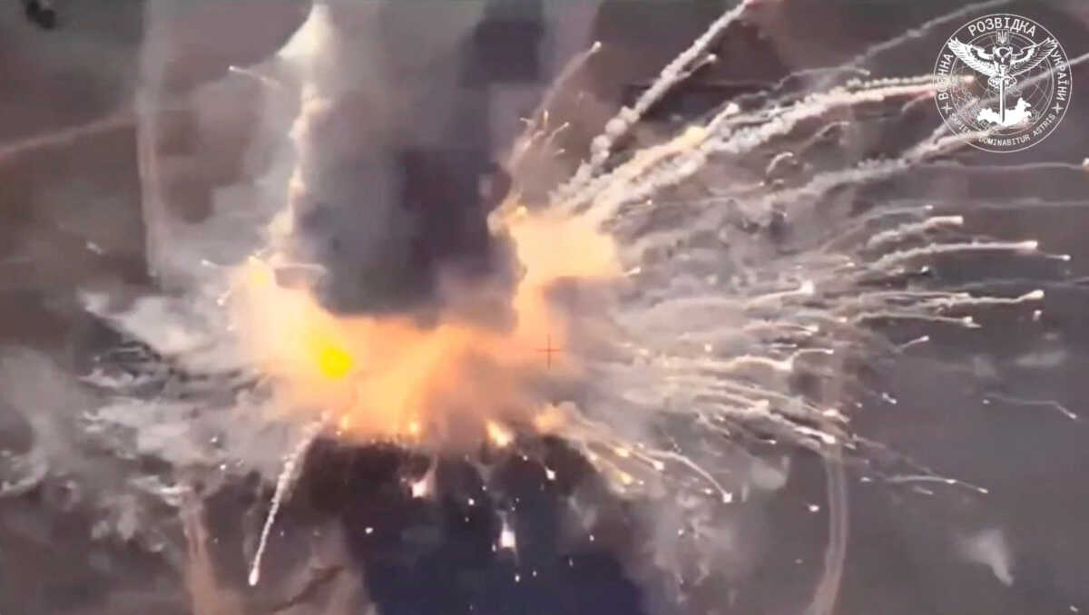 A drone view purportedly shows the destruction of a Russian long-range anti-aircraft system near Olenivka, Crimea, in this screen grab taken from a handout video released August 23, 2023. Ukrainian Main Directorate Of Intelligence