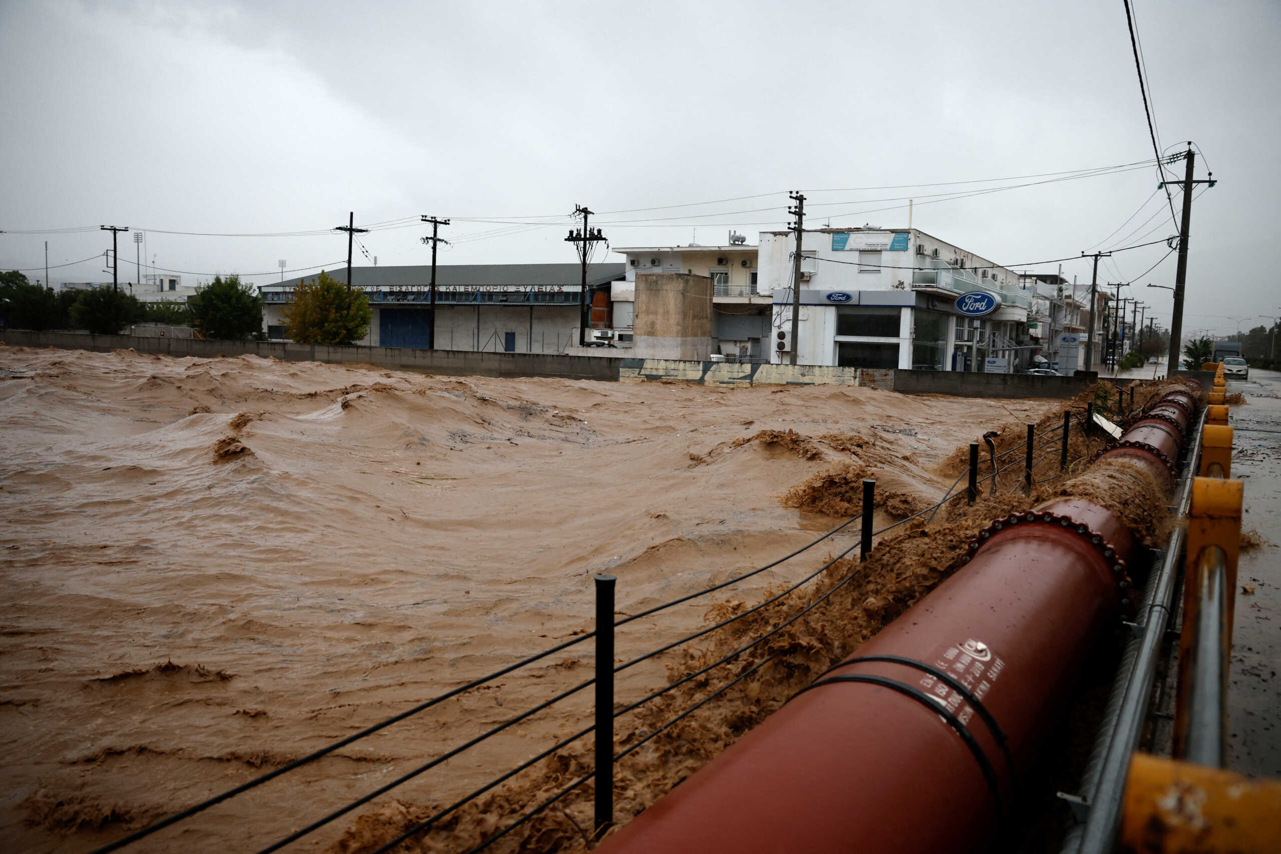 The waters of a river rise as storm "Daniel" hits the city of Volos, Greece, September 5, 2023. REUTERS