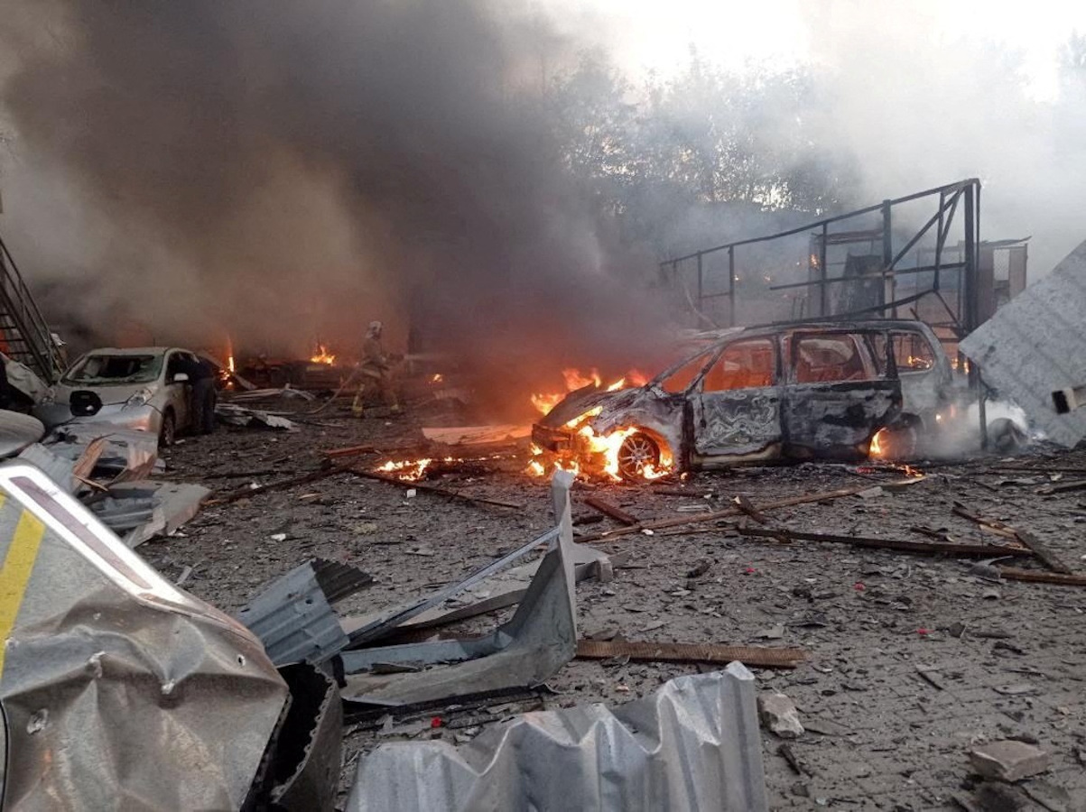 Firefighters work at a site in an area damaged during a Russian missile strike, amid Russia’s attack on Ukraine, in Rivne, Ukraine September 21, 2023. Governor of Rivne Regional Military-Civil Administration Vitalii Koval via Telegram