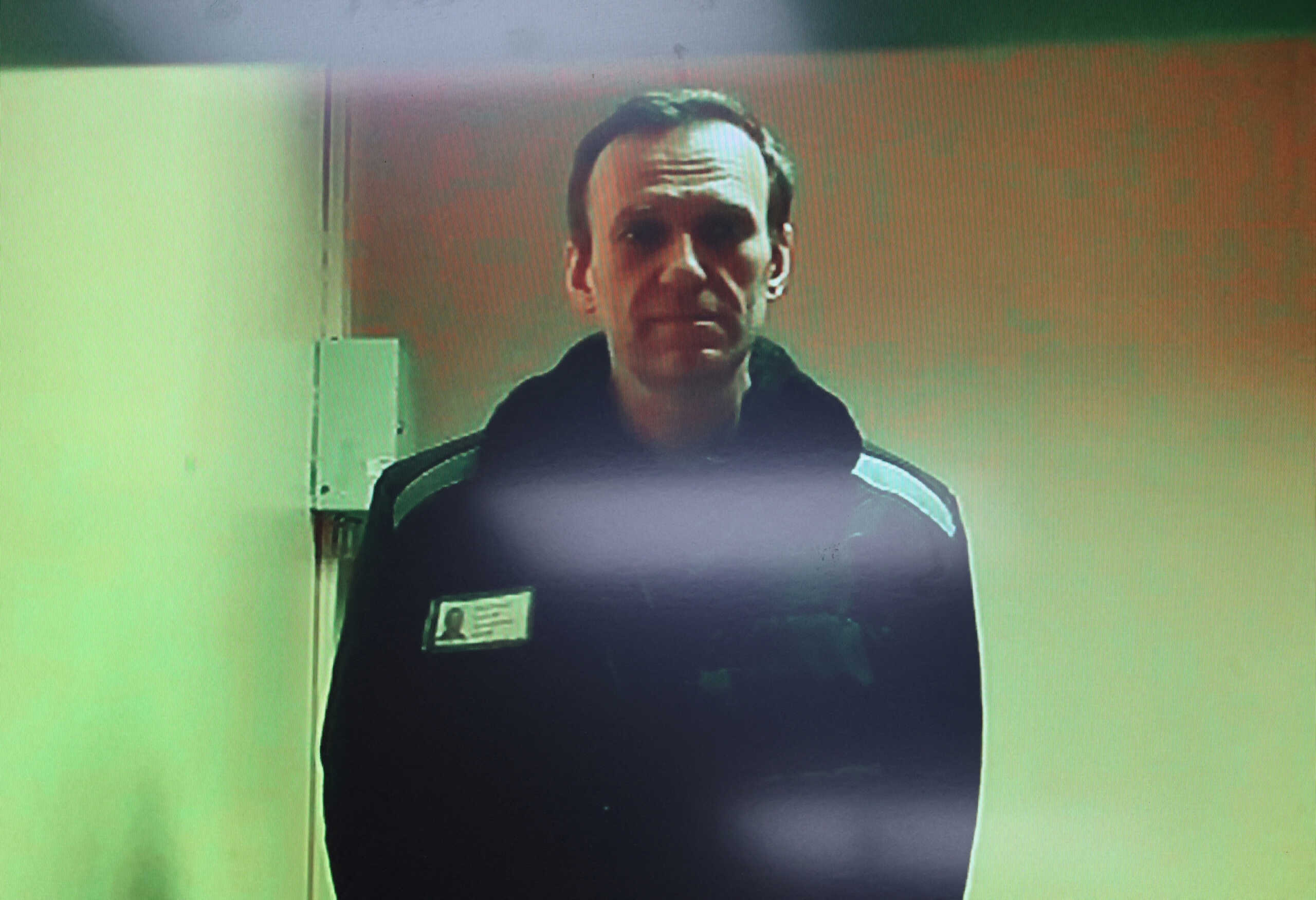 FILE PHOTO: Russian opposition leader Alexei Navalny is seen on a screen via video link from a penal colony in the Vladimir Region during a hearing at the Basmanny district court in Moscow, Russia, April 26, 2023. REUTERS