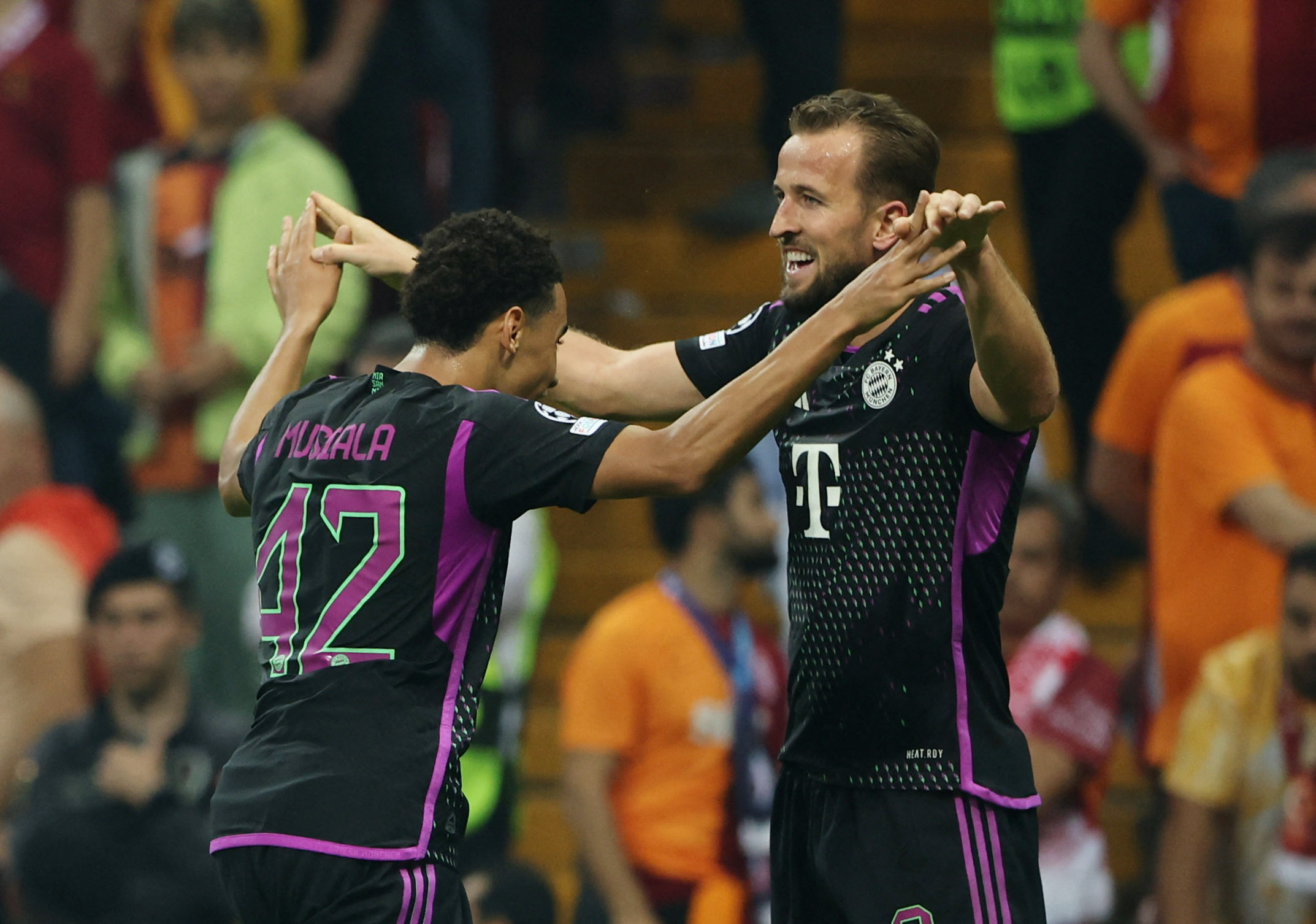 Soccer Football - Champions League - Group A - Galatasaray v Bayern Munich - Rams Park, Istanbul, Turkey - October 24, 2023 Bayern Munich's Jamal Musiala celebrates scoring their third goal with Harry Kane REUTERS