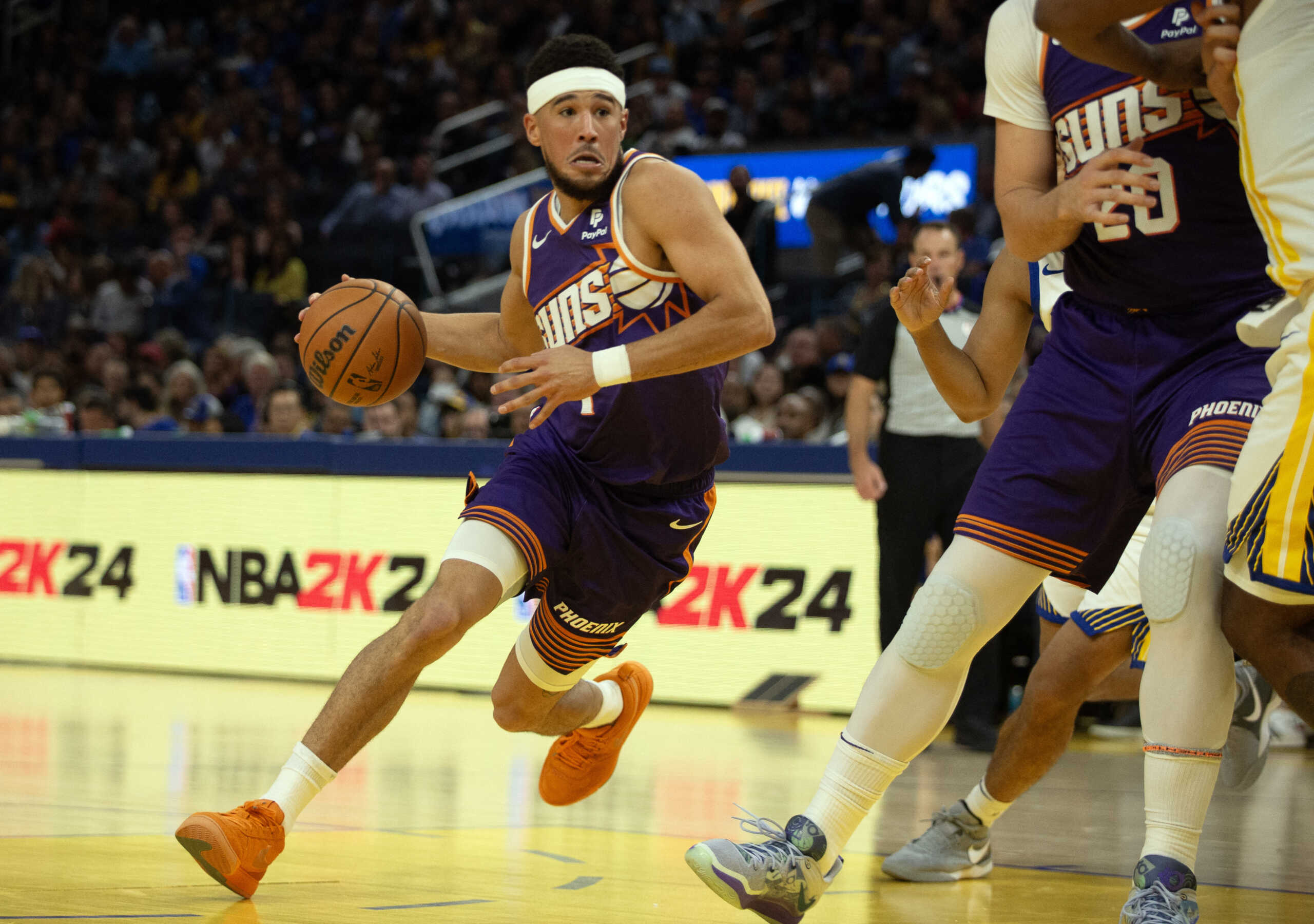 Oct 24, 2023; San Francisco, California, USA; Phoenix Suns guard Devin Booker (1) drives to the basket against the Golden State Warriors during the second quarter at Chase Center. Mandatory Credit: D. Ross Cameron-USA TODAY Sports