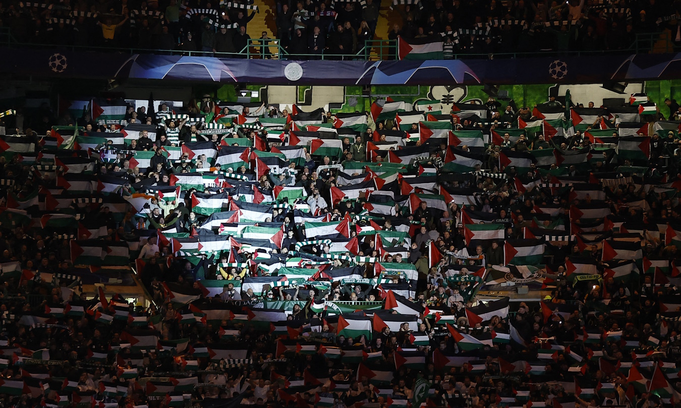 Soccer Football - Champions League - Group E - Celtic v Atletico Madrid - Celtic Park, Glasgow, Scotland, Britain - October 25, 2023 Celtic fans display Palestinian flags in support of Palestine amid the ongoing conflict between Israel and the Palestinian Islamist group Hamas before the match Action Images via Reuters