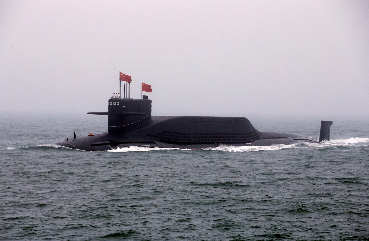 FILE PHOTO: FILE PHOTO: Chinese Navy's nuclear-powered submarine Long March 11 takes part in a naval parade off the eastern port city of Qingdao, to mark the 70th anniversary of the founding of Chinese People's Liberation Army Navy, China, April 23, 2019. REUTERS