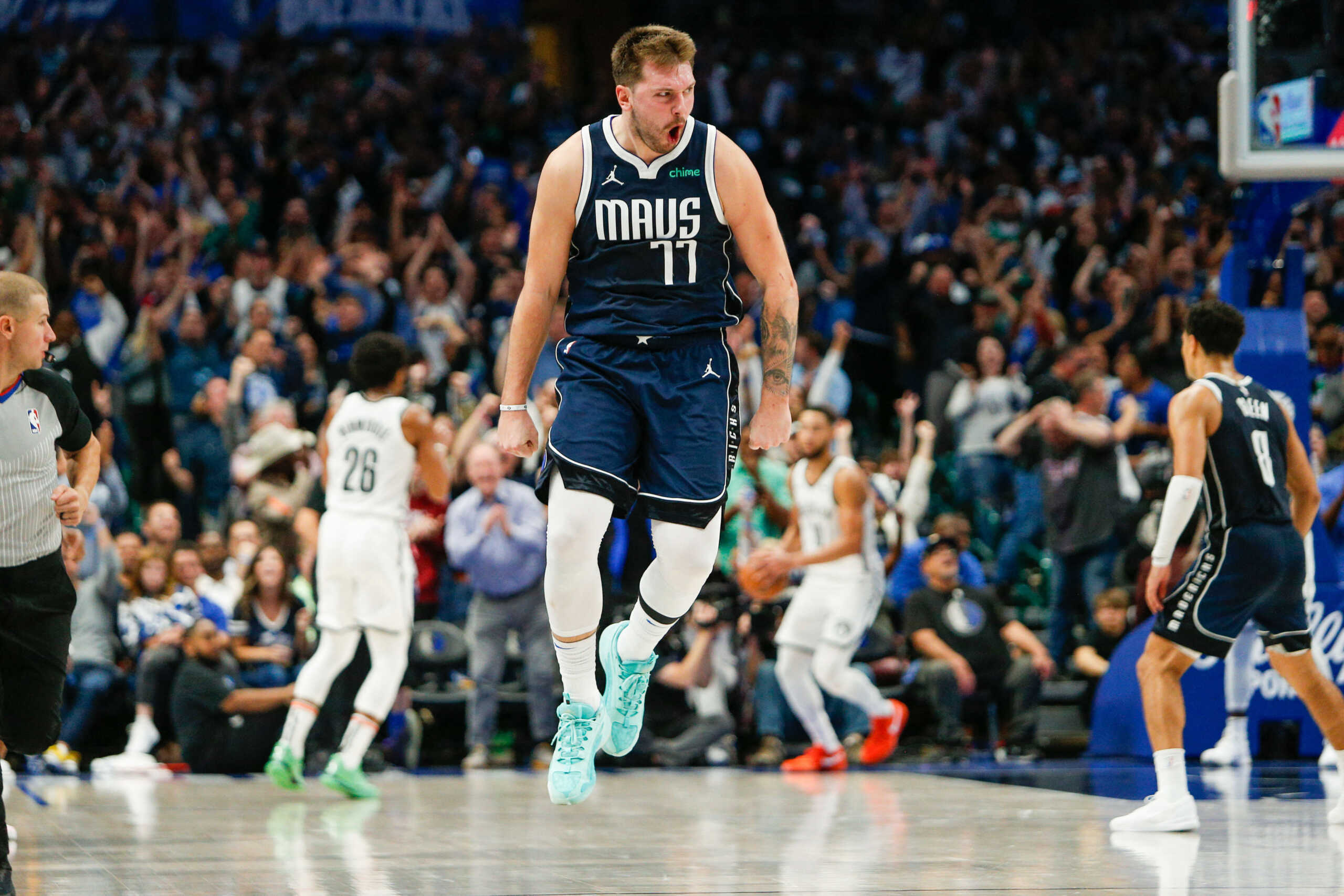Oct 27, 2023; Dallas, Texas, USA; Dallas Mavericks guard Luka Doncic (77) reacts after hitting a go ahead 3-pointer late in the fourth quarter against the Brooklyn Nets at American Airlines Center. Mandatory Credit: Andrew Dieb-USA TODAY Sports