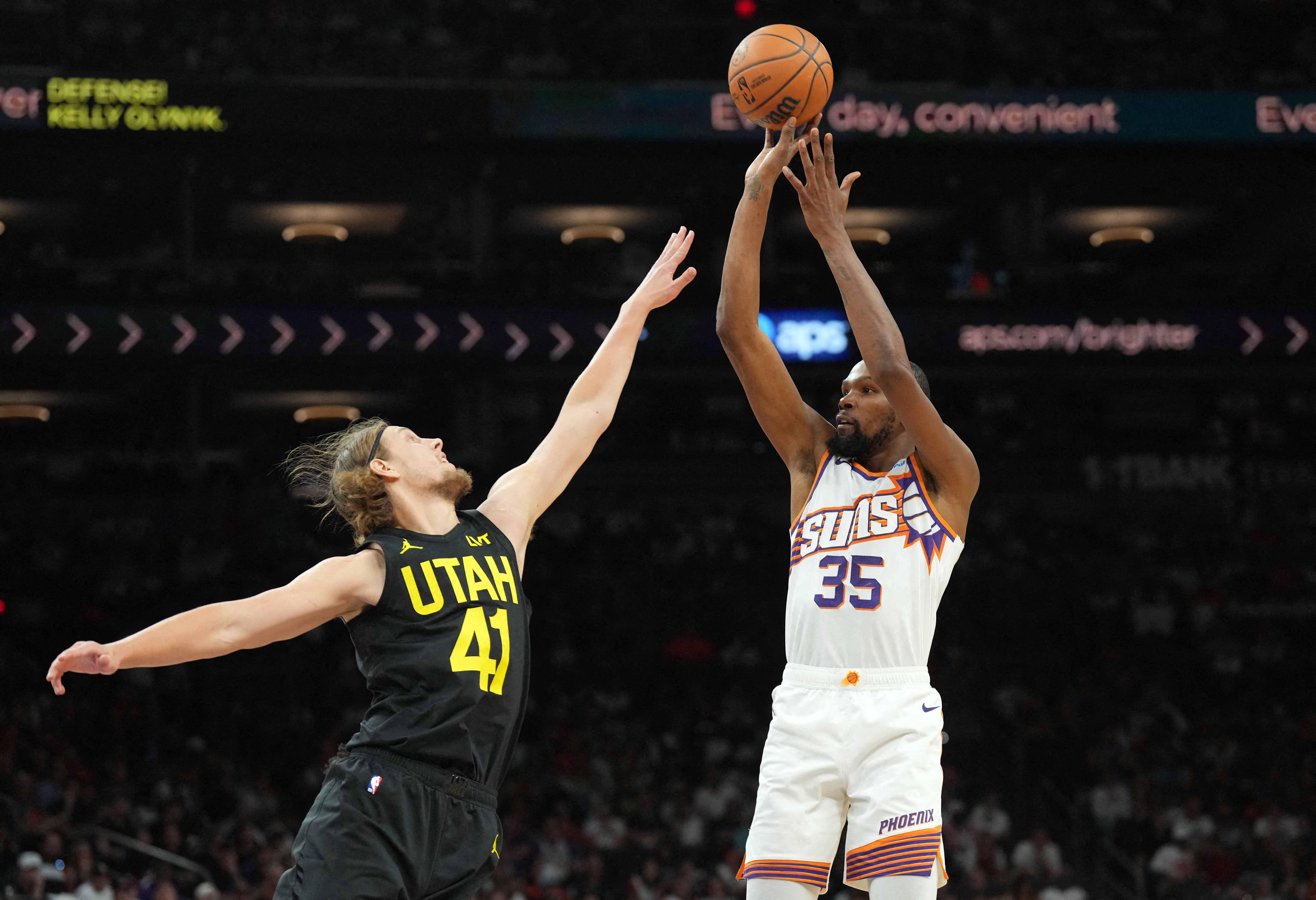 Oct 28, 2023; Phoenix, Arizona, USA; Phoenix Suns forward Kevin Durant (35) shoots over Utah Jazz forward Kelly Olynyk (41) during the second half at Footprint Center. Mandatory Credit: Joe Camporeale-USA TODAY Sports
