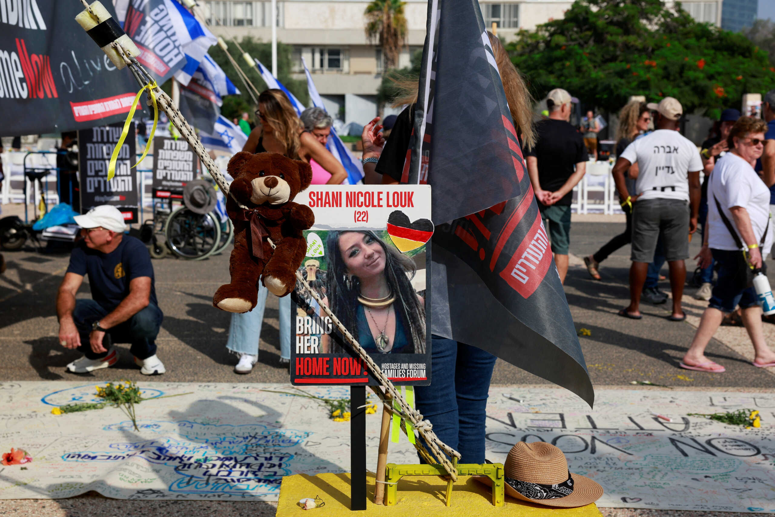 A picture of Shani Nicole Louk, who is missing, is displayed during a demonstration by family members and supporters of hostages who are being held in Gaza after they were kidnapped from Israel by Hamas gunmen, as they call for a dialogue with Israeli Prime Minister Benjamin Netanyahu and Defence Minister Yoav Gallant, in Tel Aviv, Israel October 28, 2023. REUTERS