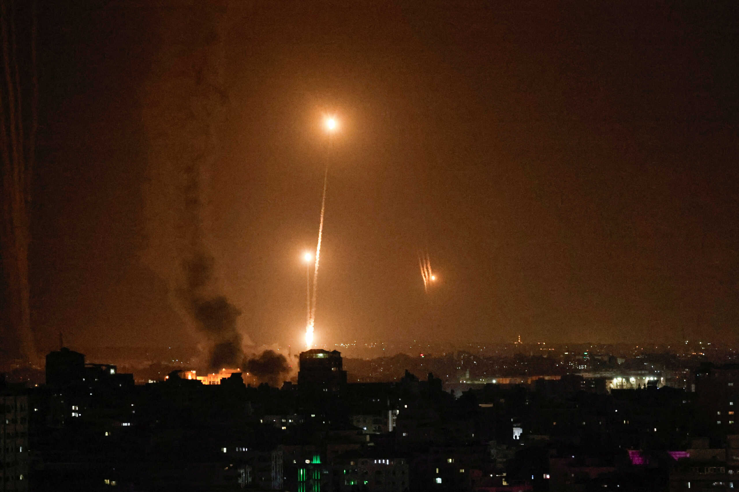 Rockets are fired from Gaza toward Israel, in Gaza, October 7, 2023. REUTERS