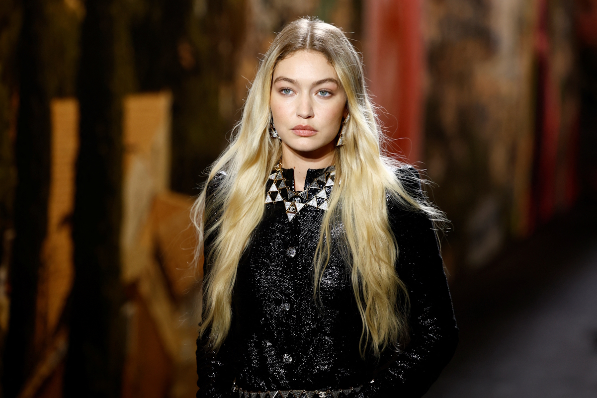 Model Gigi Hadid presents a creation by designer Virginie Viard as part of her Spring