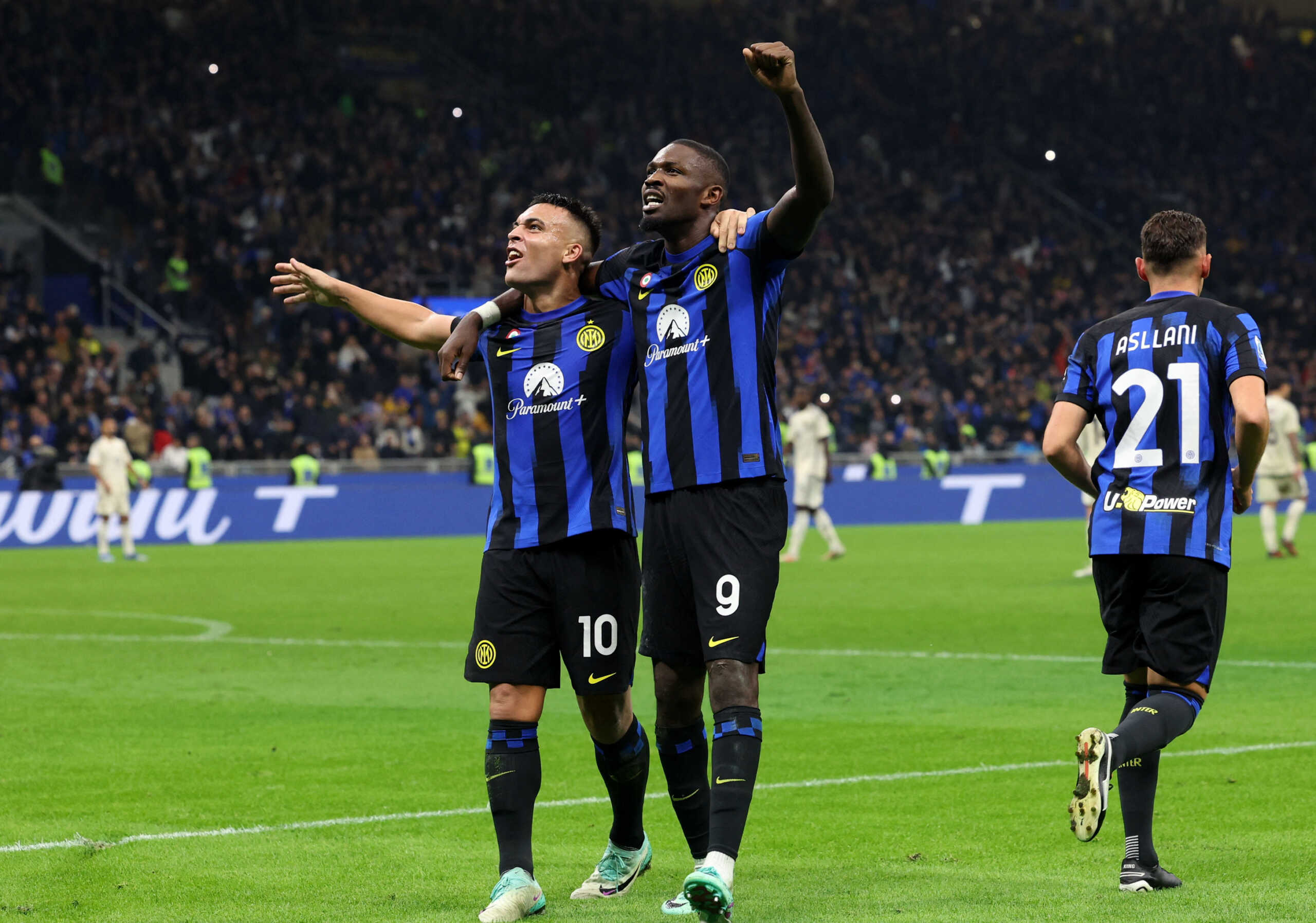 Soccer Football - Serie A - Inter Milan v AS Roma - San Siro, Milan, Italy - October 29, 2023 Inter Milan's Marcus Thuram celebrates scoring their first goal with Lautaro Martinez REUTERS