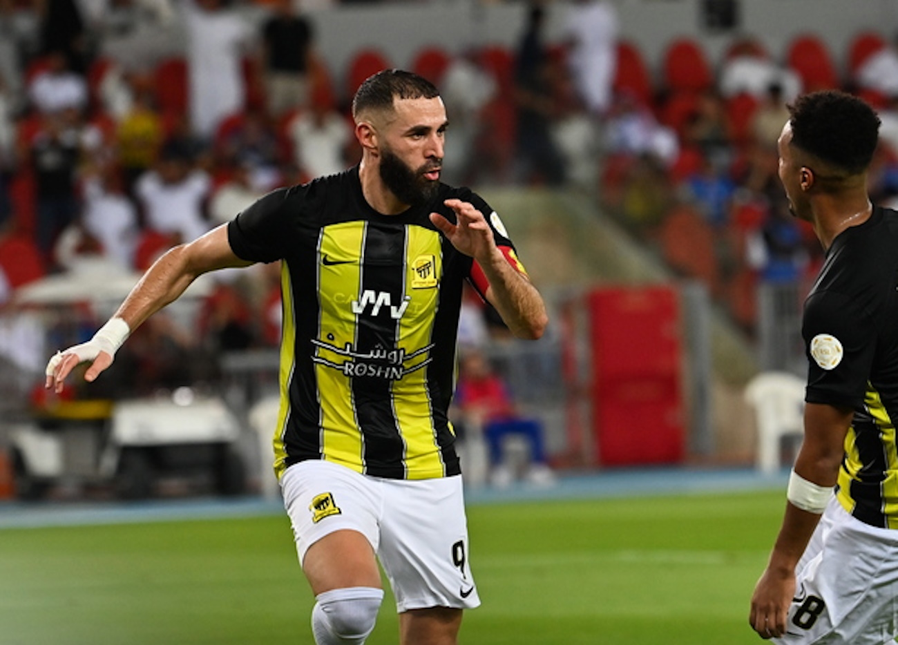 epa10834588 Al Ittihad player Karim Benzema celebrates the 2-1 goal during the Saudi League match between Al Ittihad and Al Hilal at Prince Abdullah al-Faisal Stadium, Jeddah, Saudi Arabia, 01 September 2023.  EPA