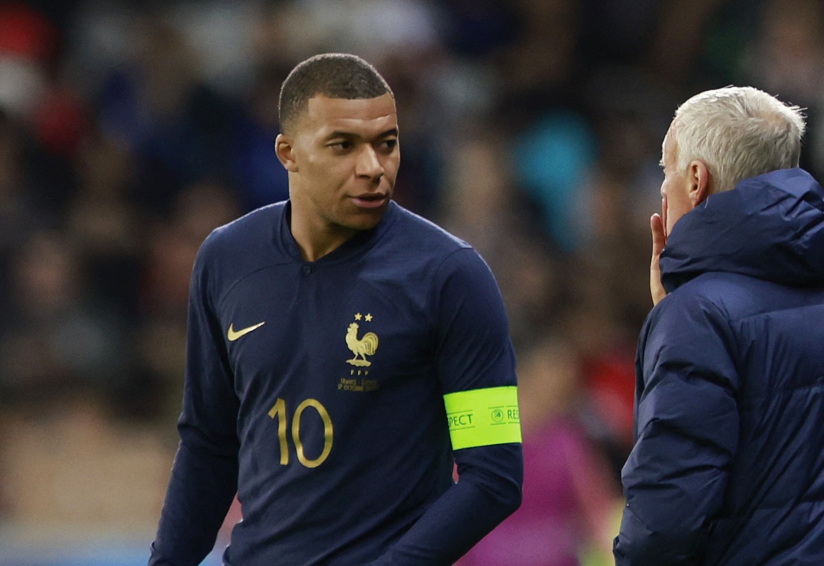 Soccer Football - International Friendly - France v Scotland - Stade Pierre-Mauroy, Villeneuve-d'Ascq, France - October 17, 2023  France coach Didier Deschamps gives instructions to Kylian Mbappe REUTERS