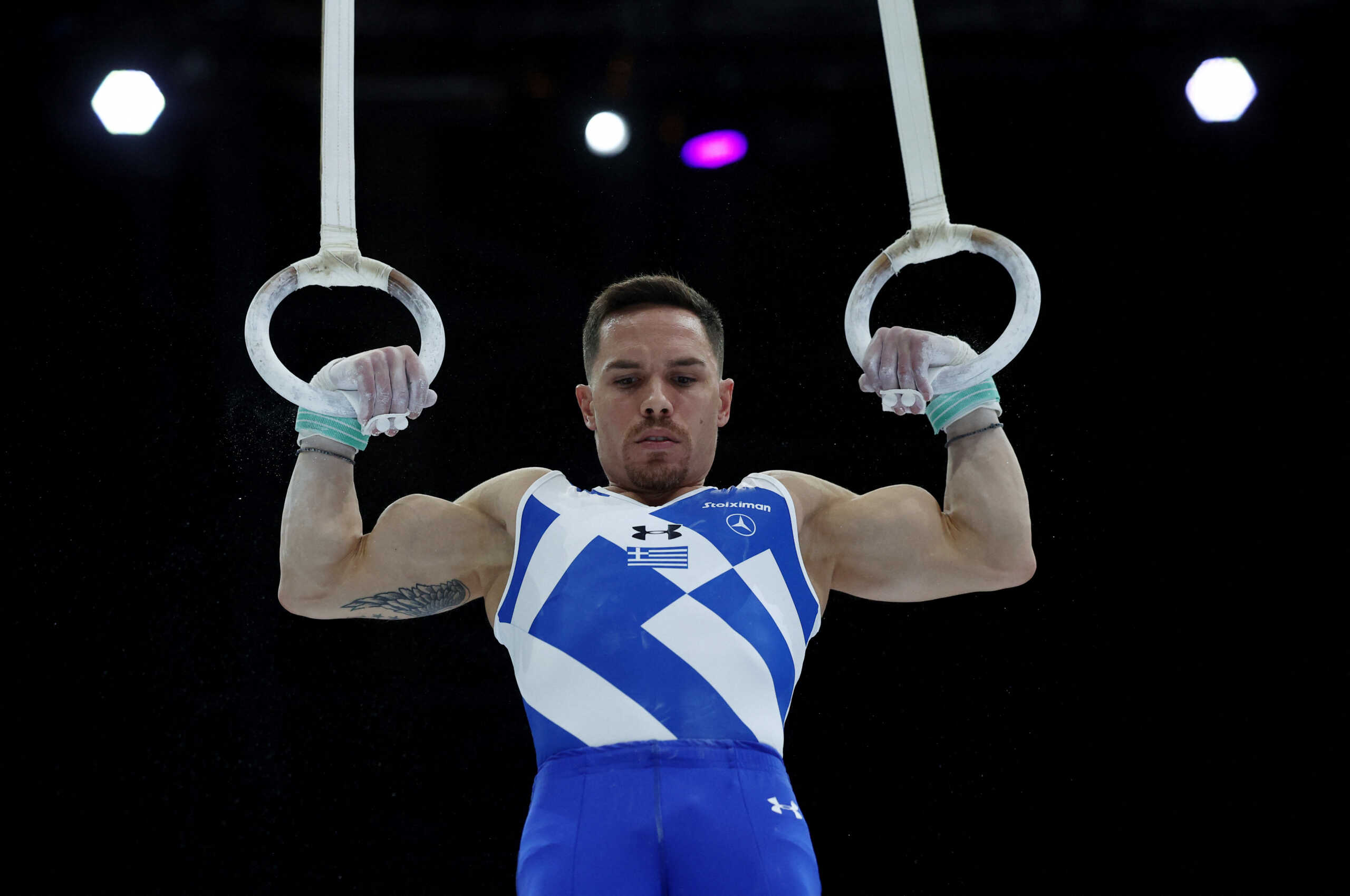 Gymnastics - 2023 World Artistic Gymnastics Championships - Sportpaleis, Antwerp, Belgium - October 7, 2023 Greece's Eleftherios Petrounias in action on the rings during the men's apparatus finals REUTERS
