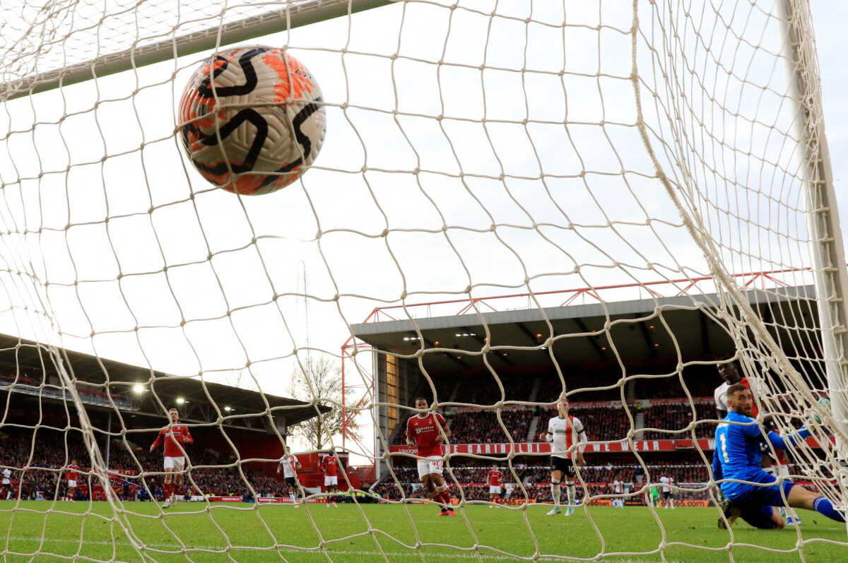 Soccer Football - Premier League - Nottingham Forest v Luton Town - The City Ground, Nottingham, Britain - October 21, 2023 Luton Town's Elijah Adebayo scores their second goal past Nottingham Forest's Matt Turner REUTERS