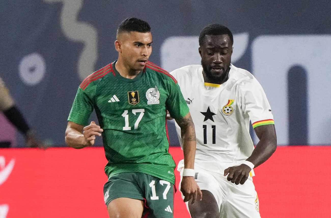 Oct 14, 2023; Charlotte, NC, USA; Mexico midfielder Orbelin Pineda (17) and Ghana midfielder Elisha Owusu (11) fight for the possession during the first half at Bank of America Stadium. Mandatory Credit: Jim Dedmon-USA TODAY Sports