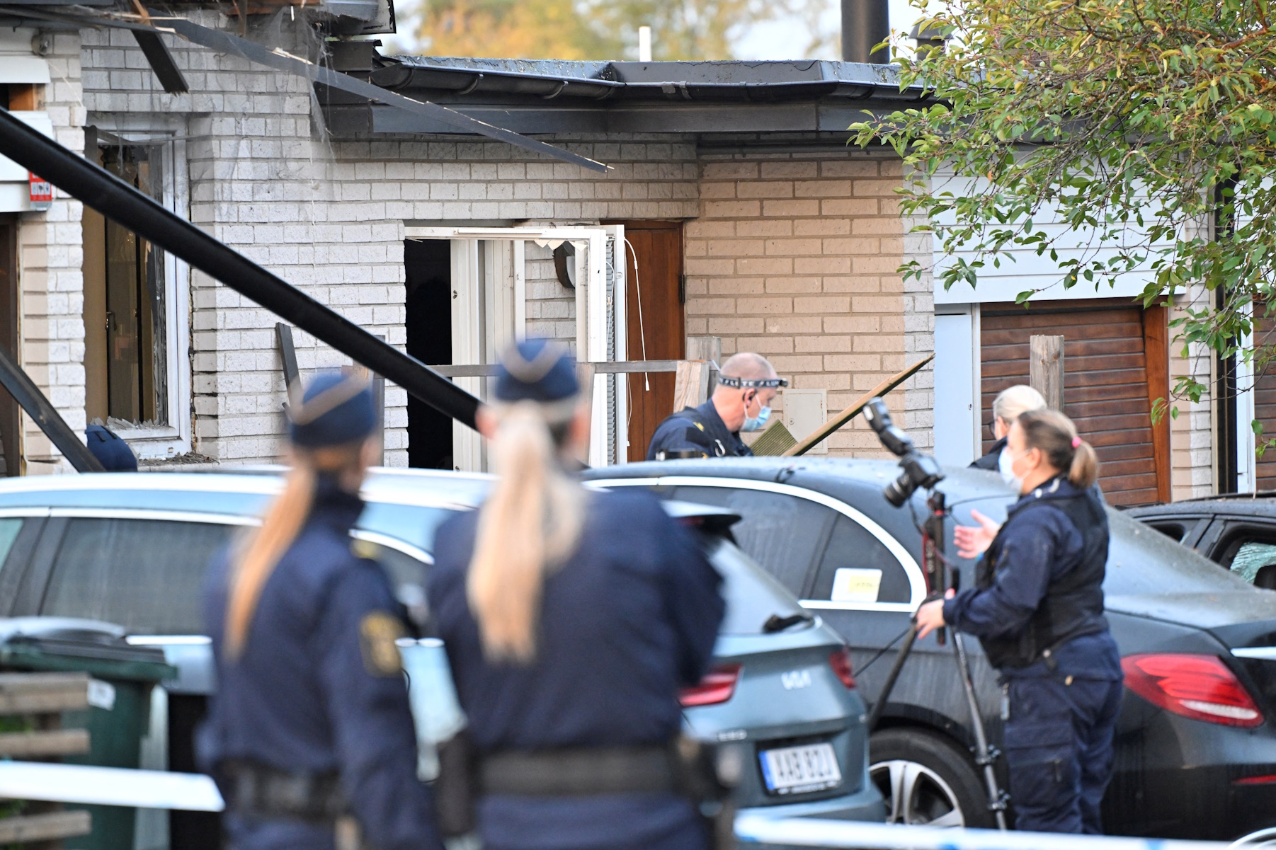 Police and bomb technicians investigate the explosion at a terraced house in Huddinge south of Stockholm, Sweden, October 2, 2023. TT News Agency