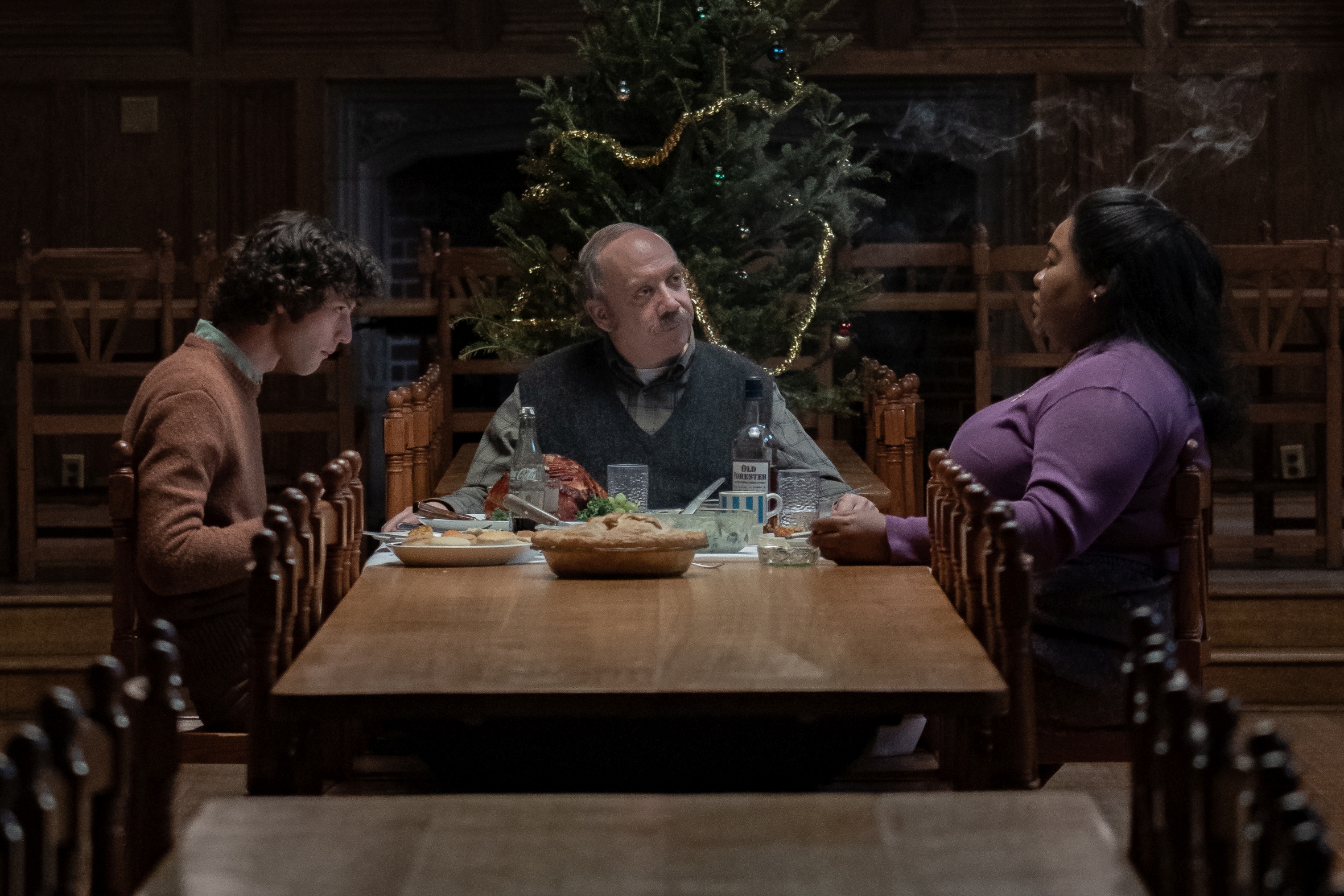 HO_14895_R 
(l-r.) Dominic Sessa stars as Angus Tully, Paul Giamatti as Paul Hunham and Da’Vine Joy Randolph as Mary Lamb in director Alexander Payne’s THE HOLDOVERS, a Focus Features release.
Credit: Seacia Pavao