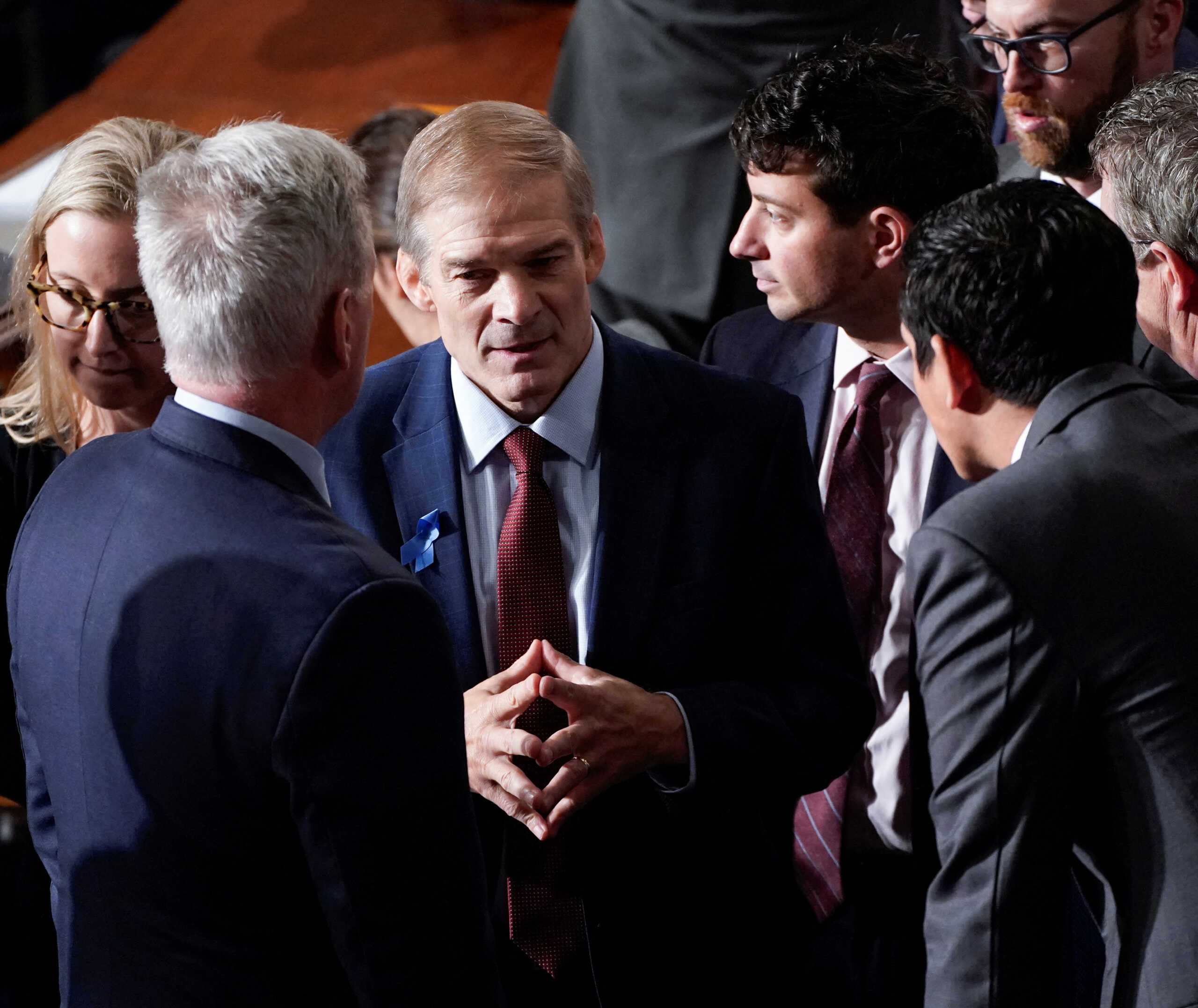 U.S. Rep. Jim Jordan (R-OH) confers with fellow Republicans including former Speaker of the House Kevin McCarthy (R-CA) after a second round of voting for a new Speaker of the House ended with Jordan once again failing to win the Speaker's gavel on the floor of the House of Representatives at the U.S. Capitol in Washington, U.S., October 17, 2023. REUTERS