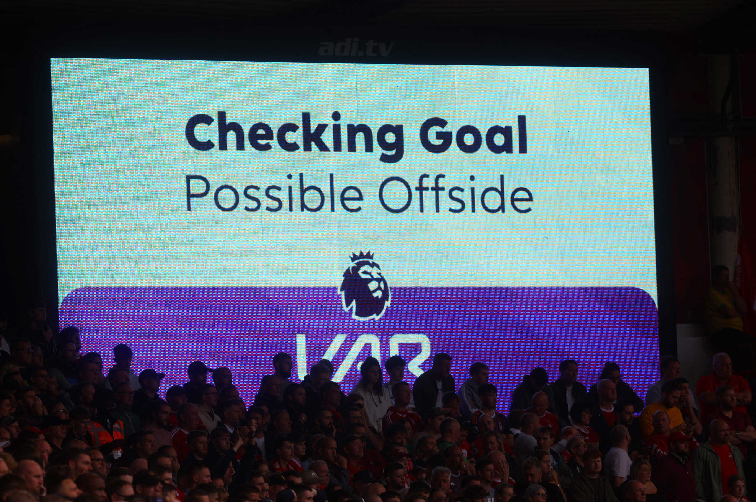 Soccer Football - Premier League - Nottingham Forest v Brentford - The City Ground, Nottingham, Britain - October 1, 2023 The big screen displays a VAR review message before Brentford's Christian Norgaard's goal is awarded Action Images via Reuters