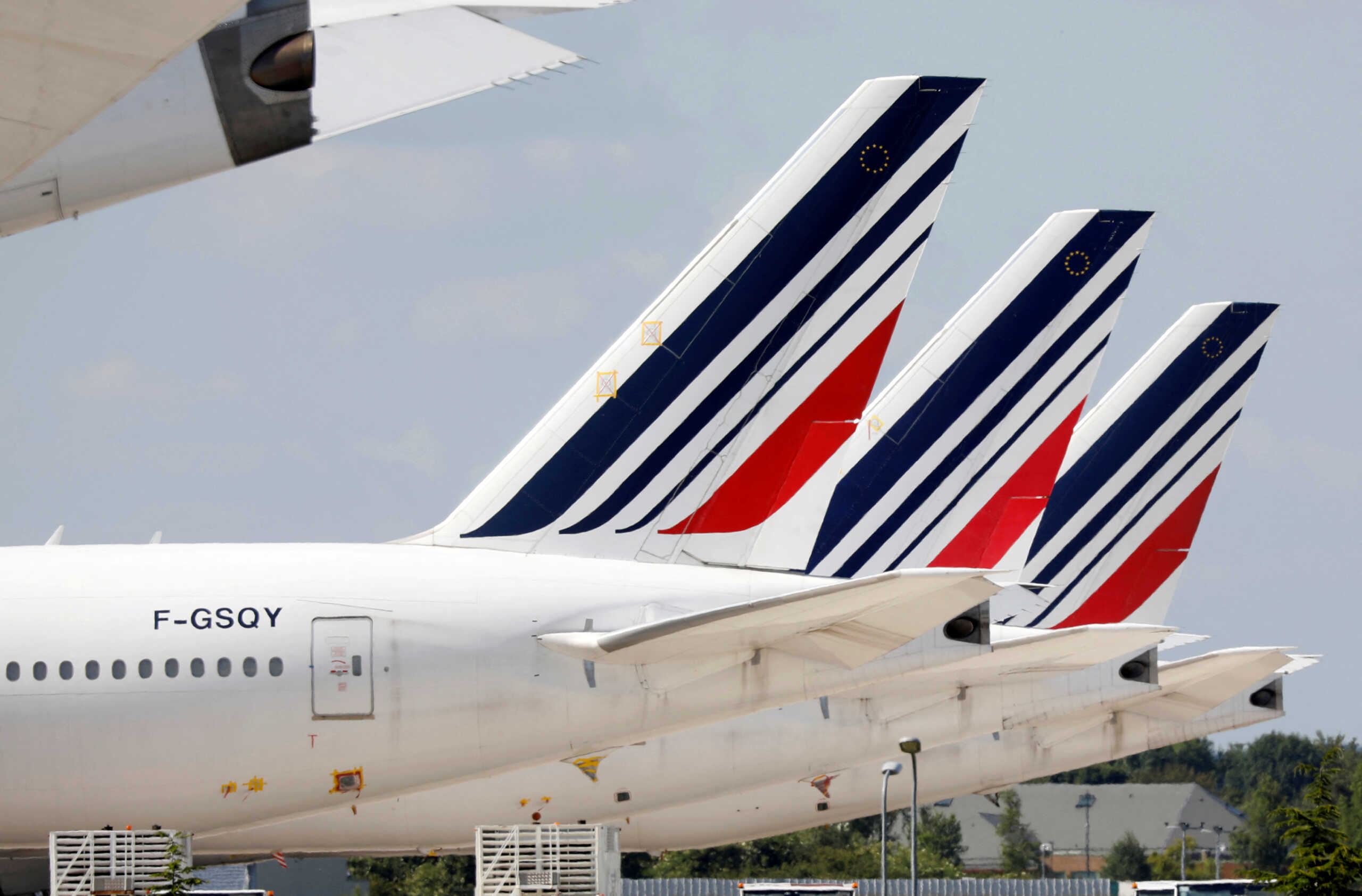 FILE PHOTO: Air France Boeing 777 planes sit on the tarmac at Paris Charles de Gaulle airport in Roissy-en-France during the outbreak of the coronavirus disease (COVID-19) in France May 25, 2020. Picture taken May 25, 2020.   REUTERS