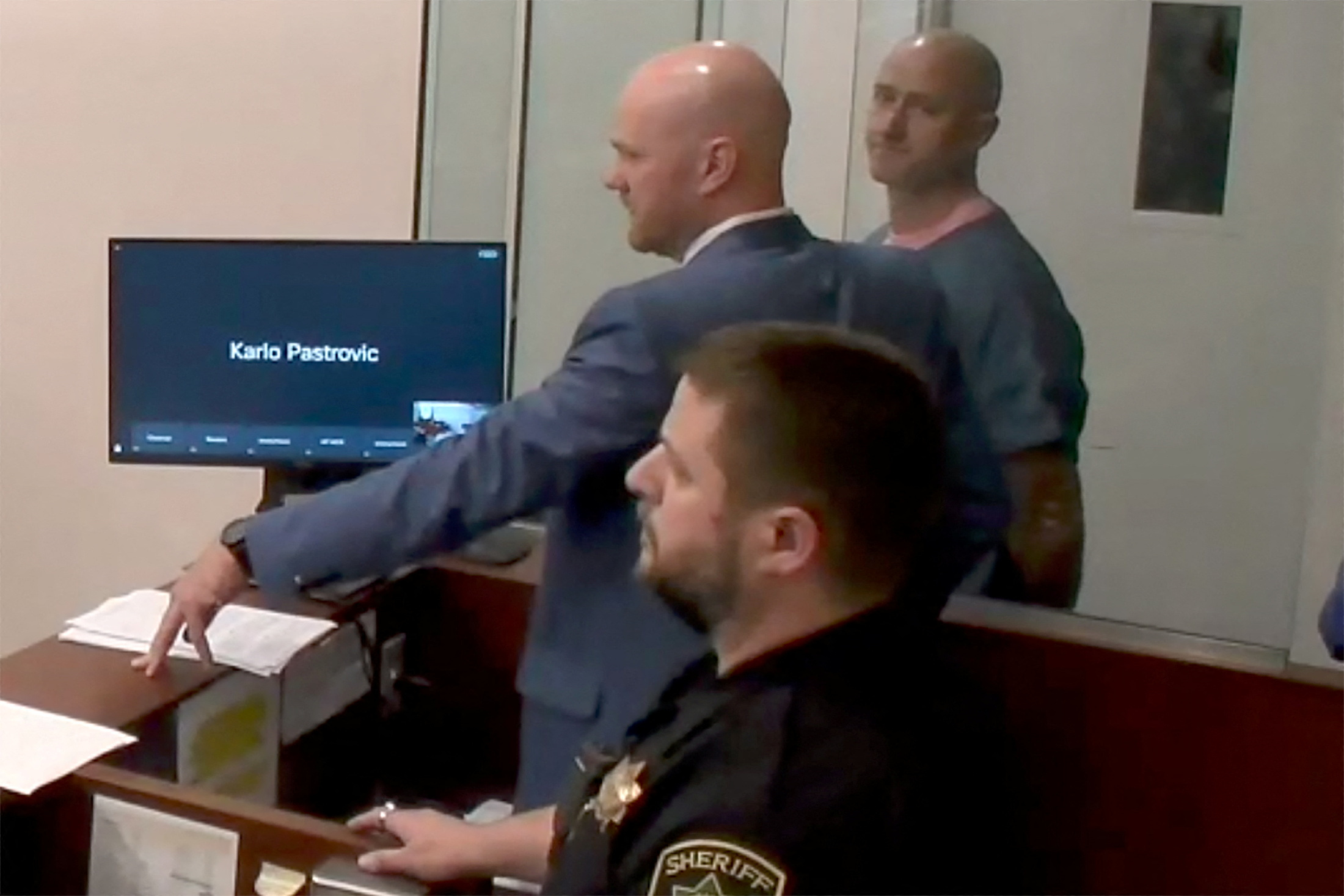 Joseph David Emerson, 44, an Alaska Airlines pilot who was riding in the cockpit "jump seat" and is accused of trying to disable the engines Horizon Air jet, appears in Multnomah County court in Portland, Oregon, U.S. October 24, 2023 in a still image from video.  Multnomah Circuit Court