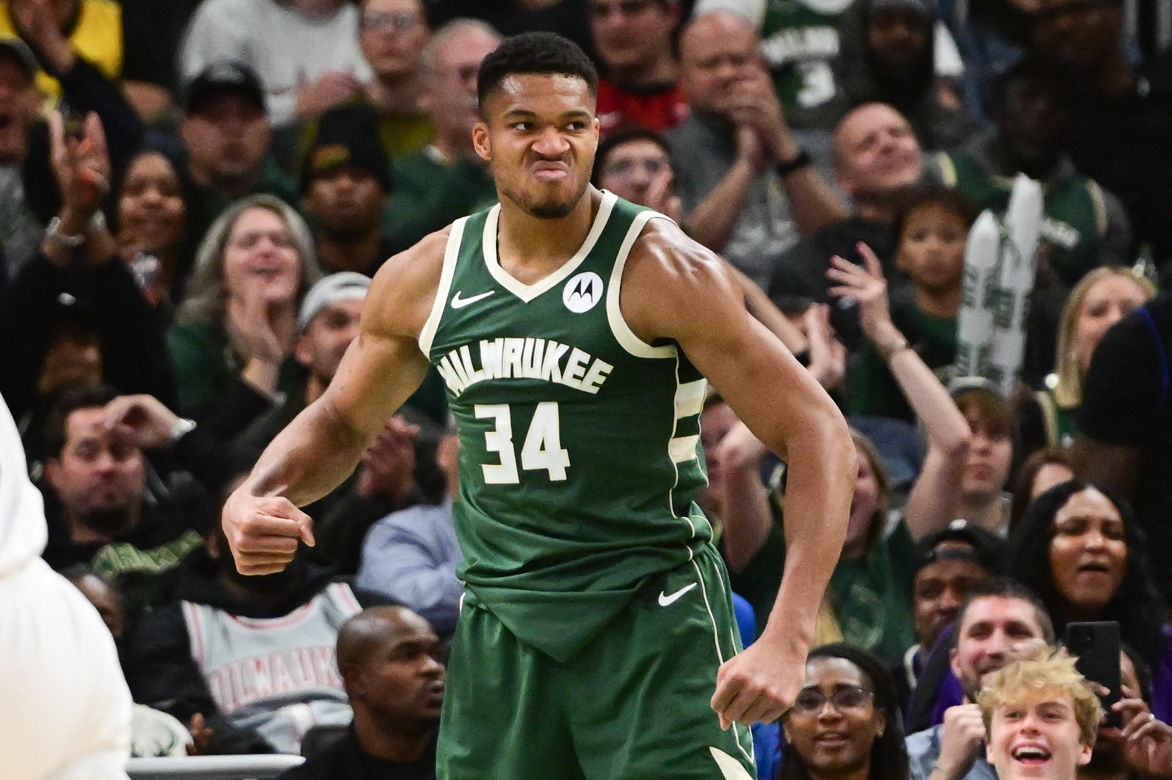 Oct 30, 2023; Milwaukee, Wisconsin, USA;  Milwaukee Bucks forward Giannis Antetokounmpo (34) reacts after scoring a basket in the fourth quarter against the Miami Heat at Fiserv Forum. Mandatory Credit: Benny Sieu-USA TODAY Sports