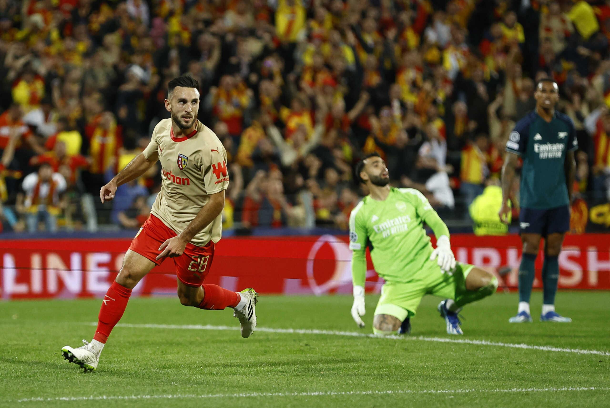 Soccer Football - Champions League - Group B - RC Lens v Arsenal - Stade Bollaert-Delelis, Lens, France - October 3, 2023  RC Lens' Adrien Thomasson celebrates scoring their first goal REUTERS