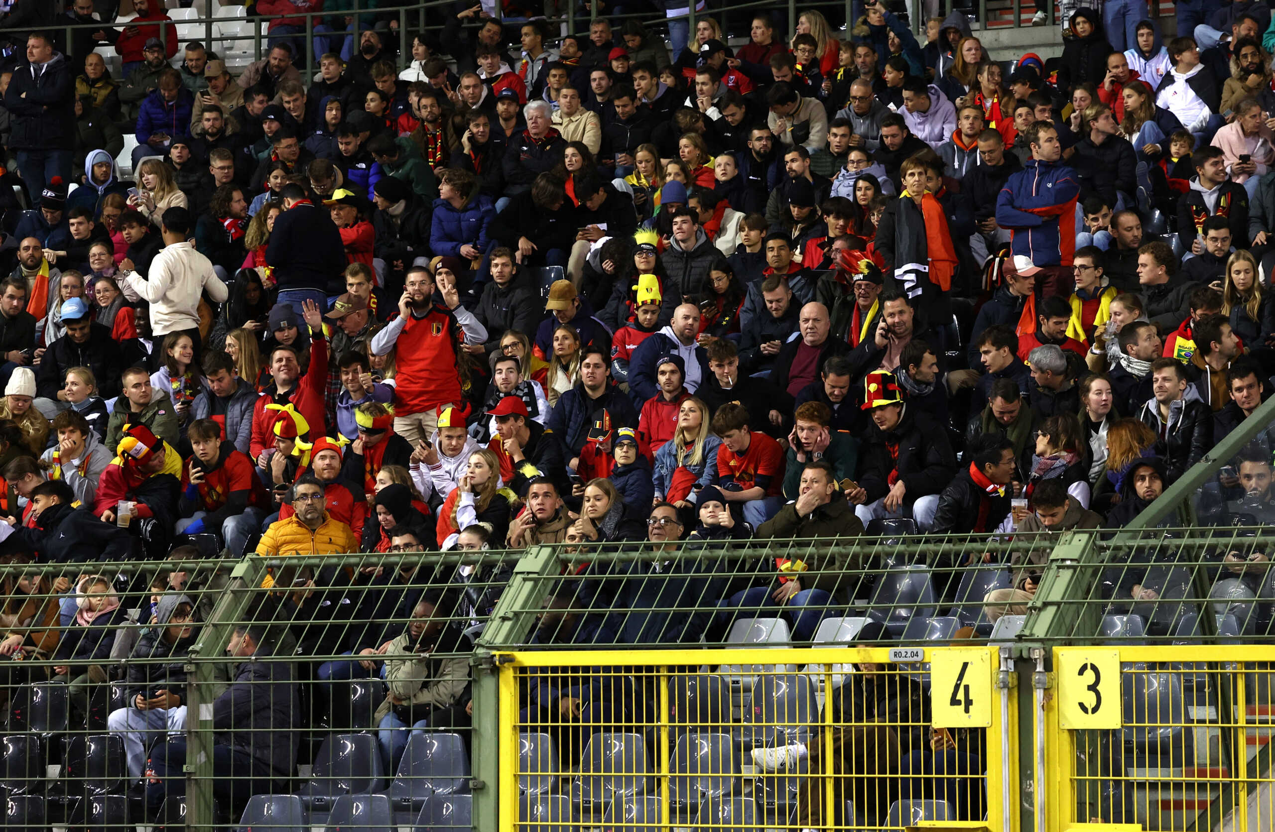 Soccer Football - Euro 2024 Qualifier - Group F - Belgium v Sweden - King Baudouin Stadium, Brussels, Belgium - October 16, 2023 Belgium fans inside the stadium as the match is abandoned after a shooting in Brussels REUTERS