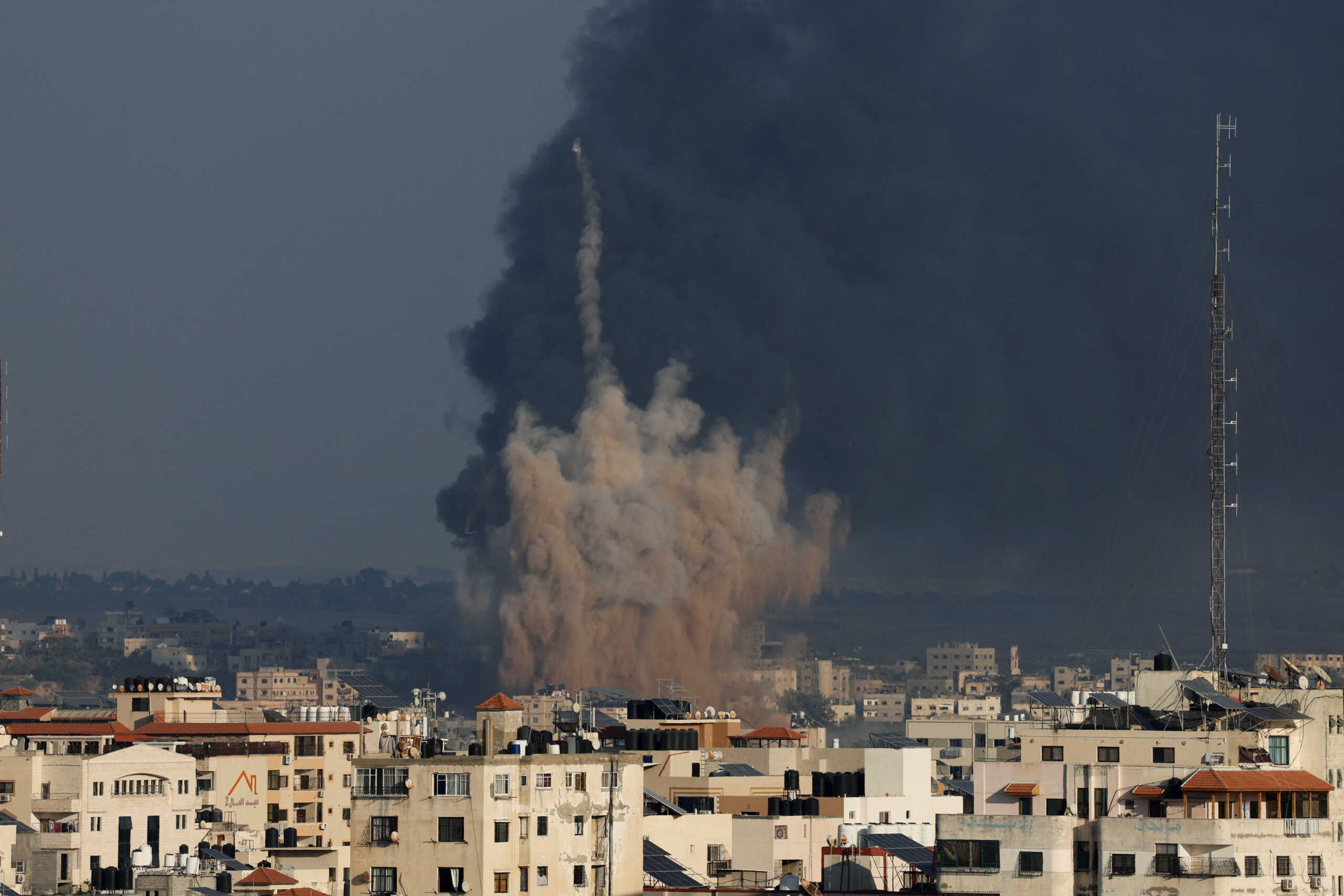 Smoke rises from Israeli strikes as rockets are fired from Gaza towards Israel, in Gaza, October 10, 2023. REUTERS